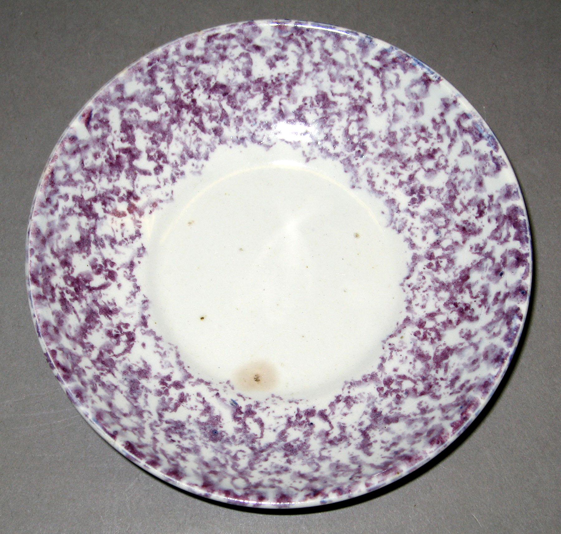 1963.0589 Spatterware saucer