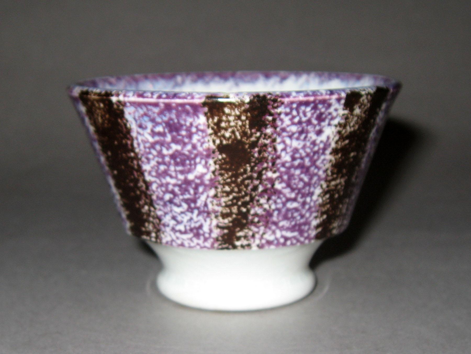1963.0590 Purple and brown stripe spatterware teabowl