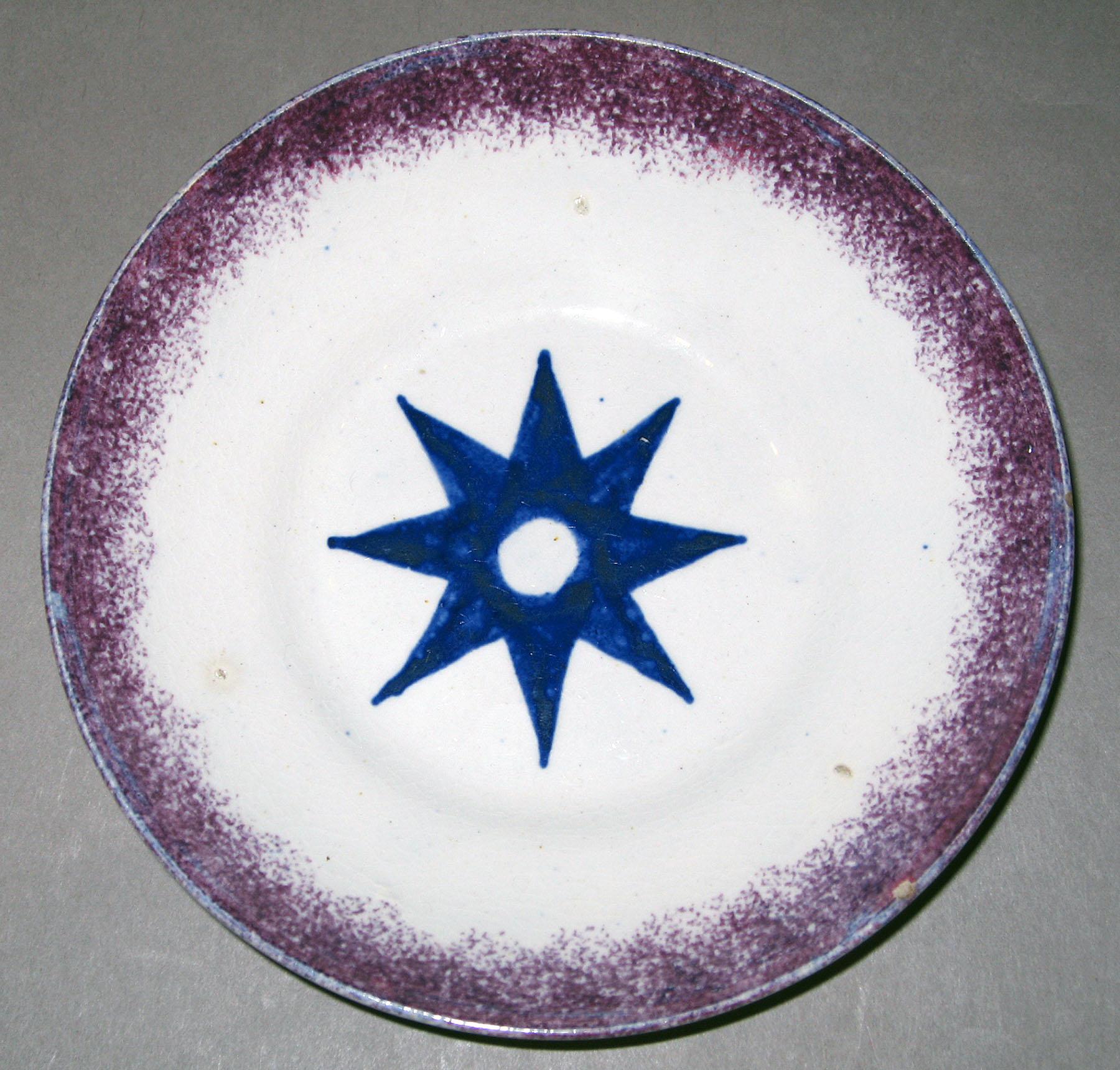 1963.0600.001 B Spatterware saucer