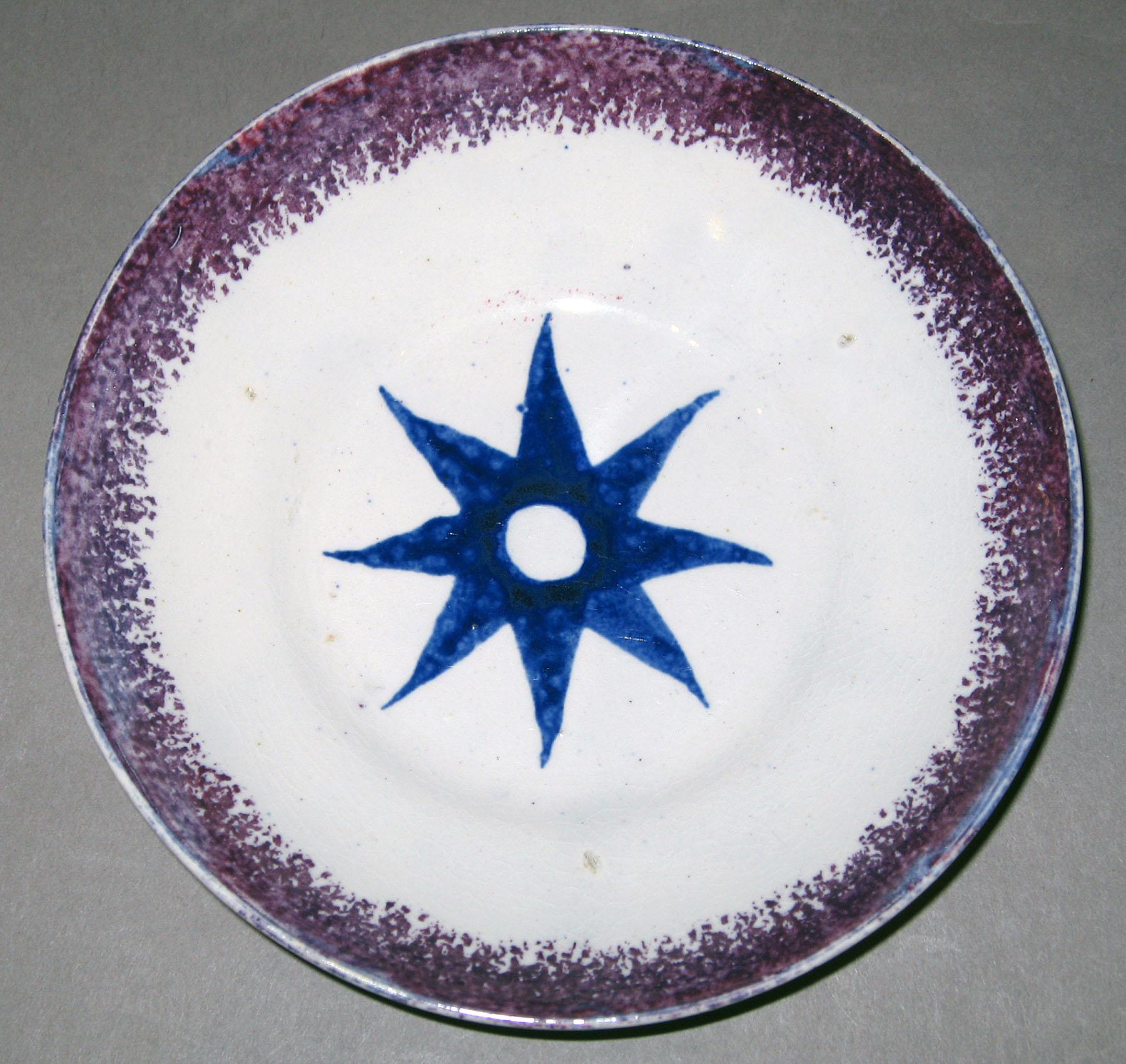 1963.0600.003 B Spatterware saucer