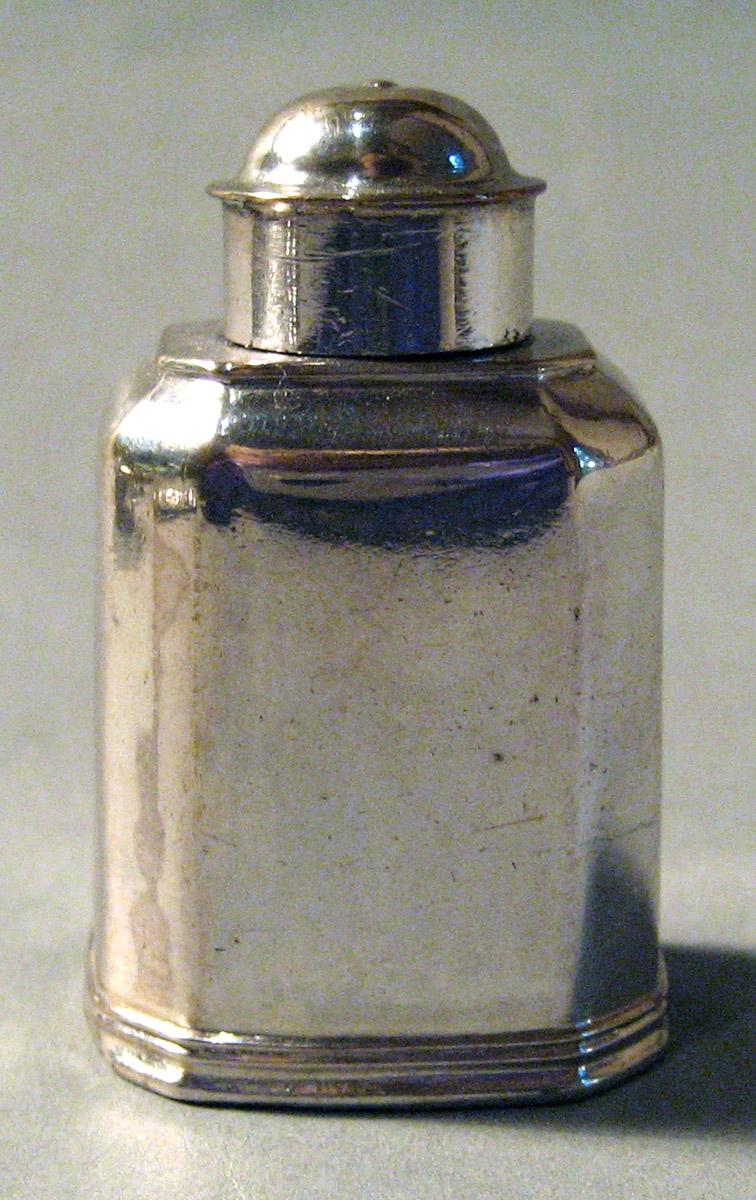 1955.0136.077 Silver Tea Cannister side 1