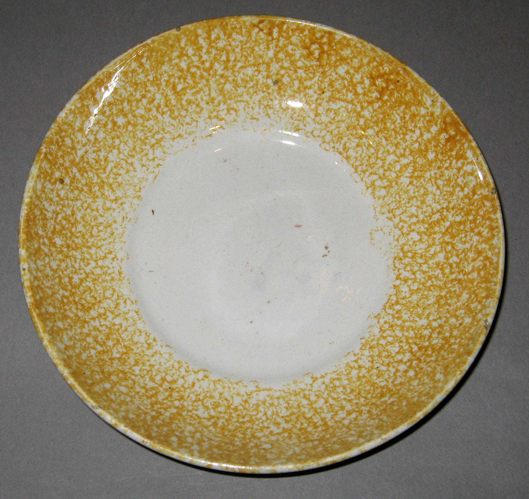 1963.0610.004 Spatterware saucer