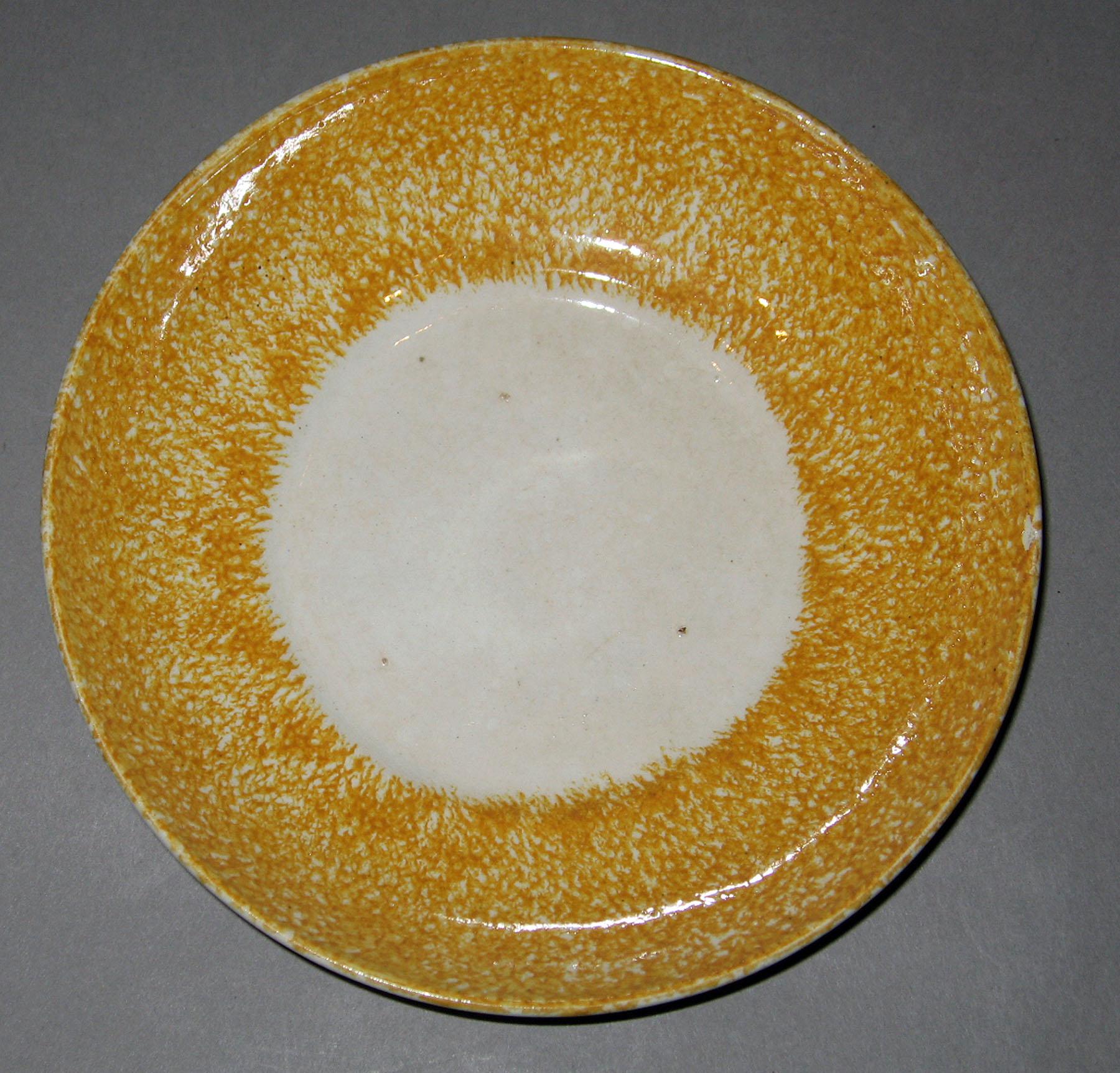 1963.0610.005 Spatterware saucer