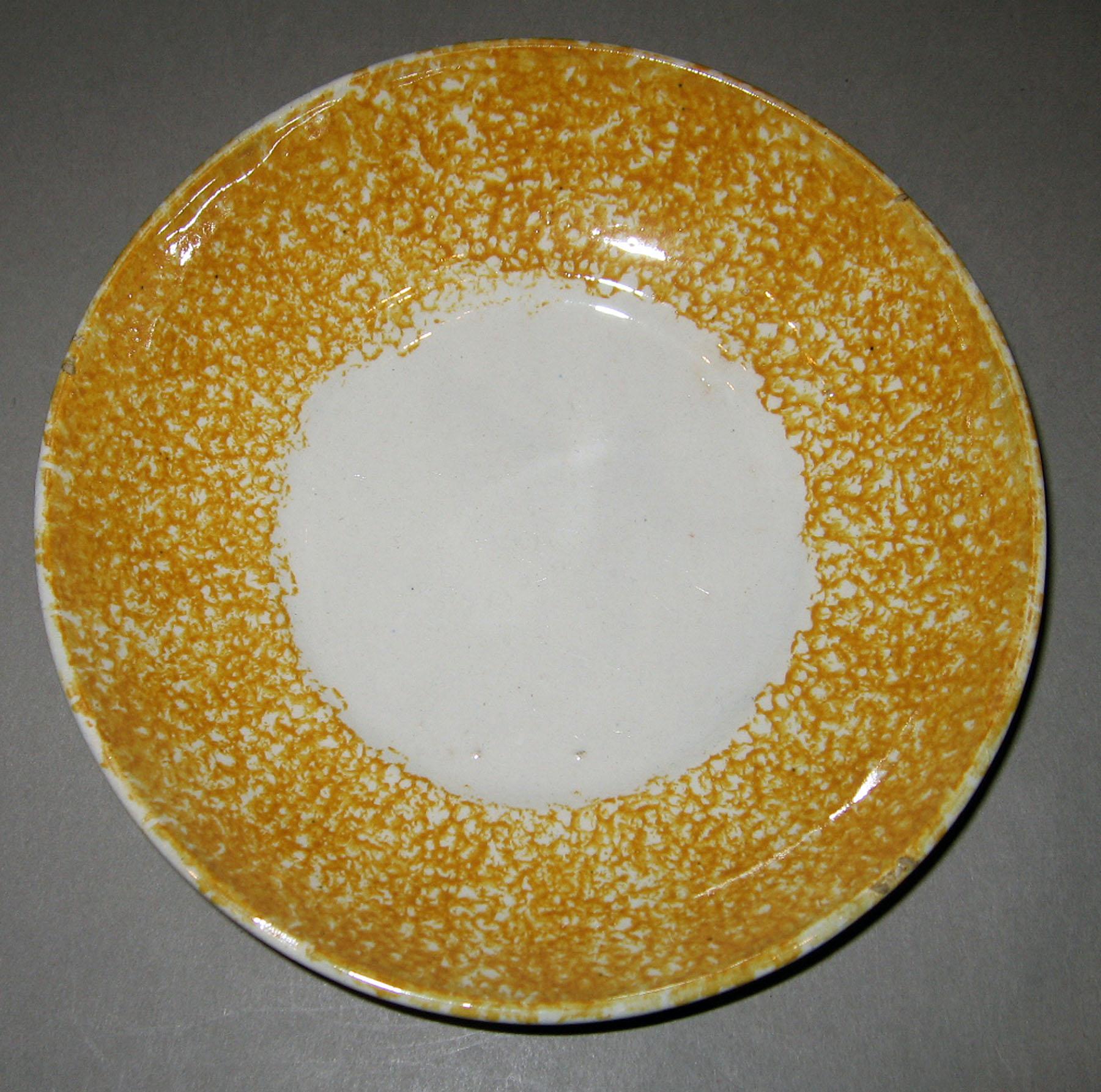 1963.0610.006 Spatterware saucer