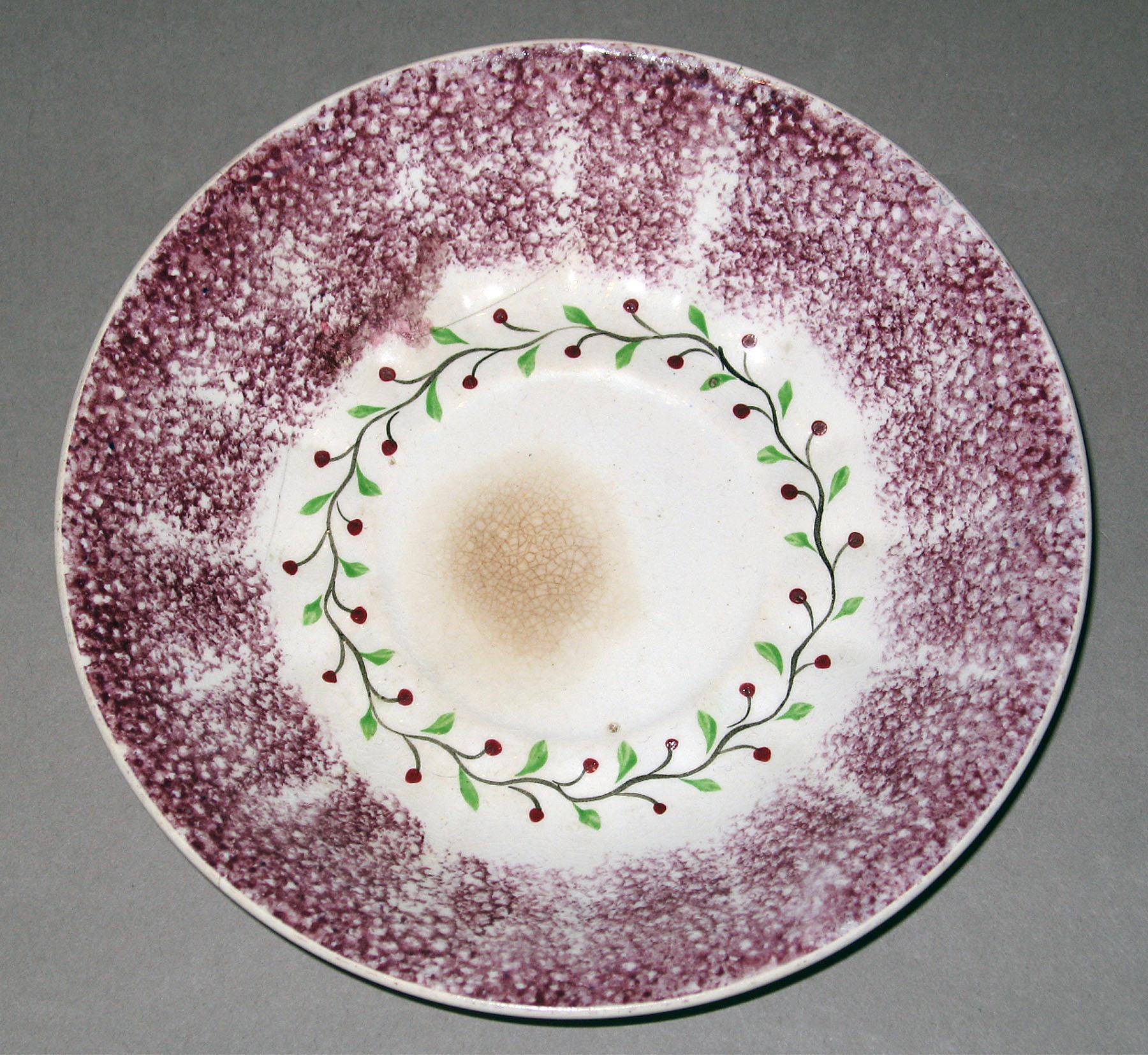 1963.0612.001 B Spatterware saucer