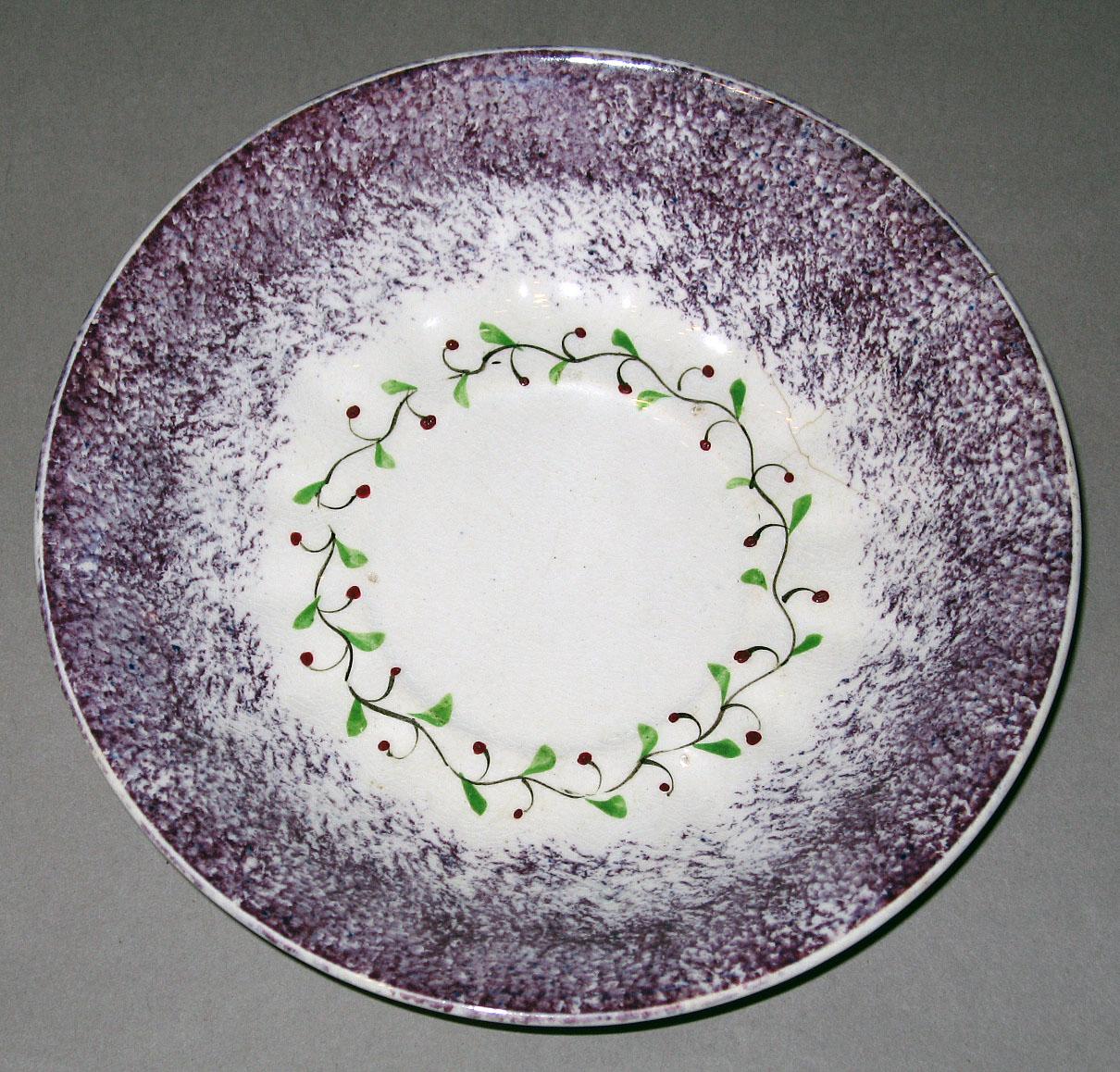 1963.0612.004 B Spatterware saucer