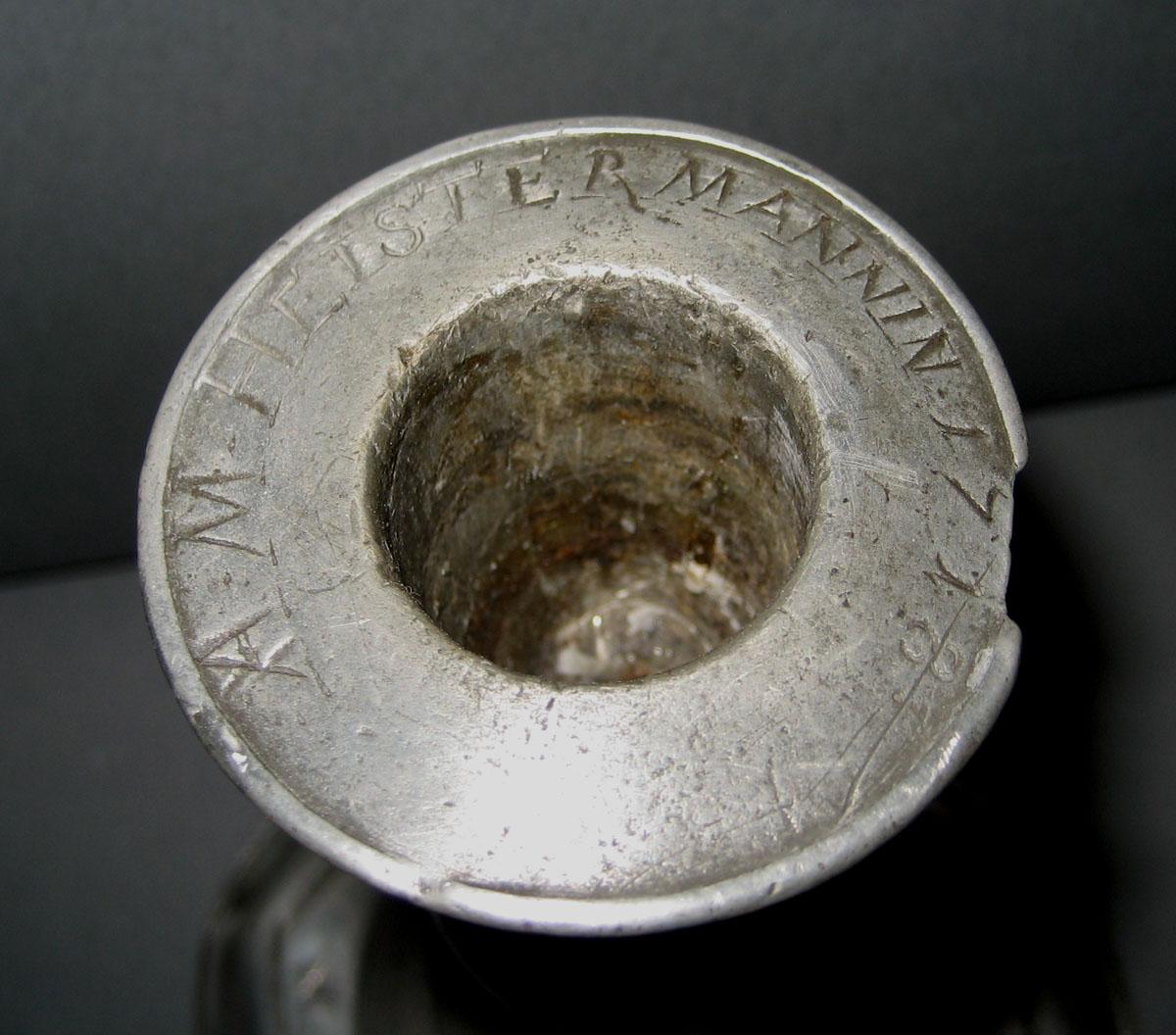 1963.0631.001 Candlestick (inscription)