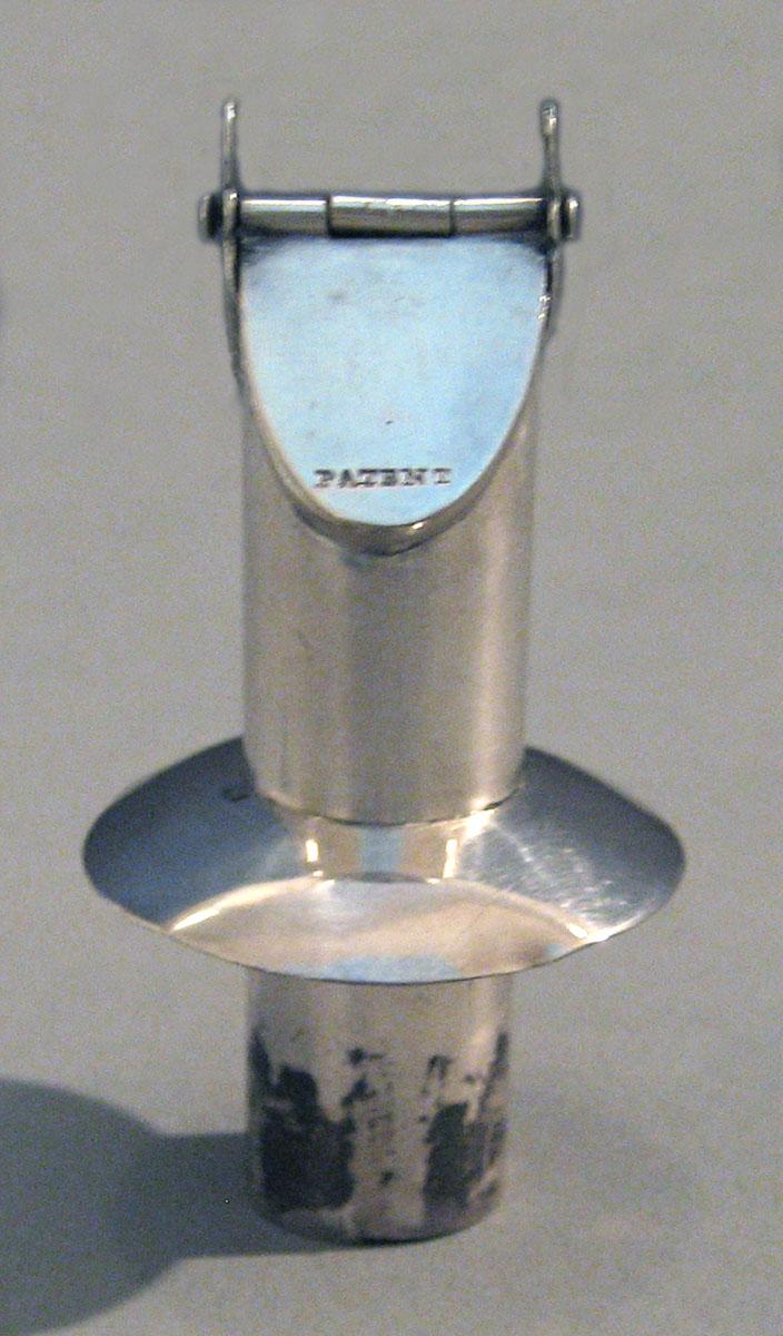 1963.0682 Silver Decanter stopper side 1