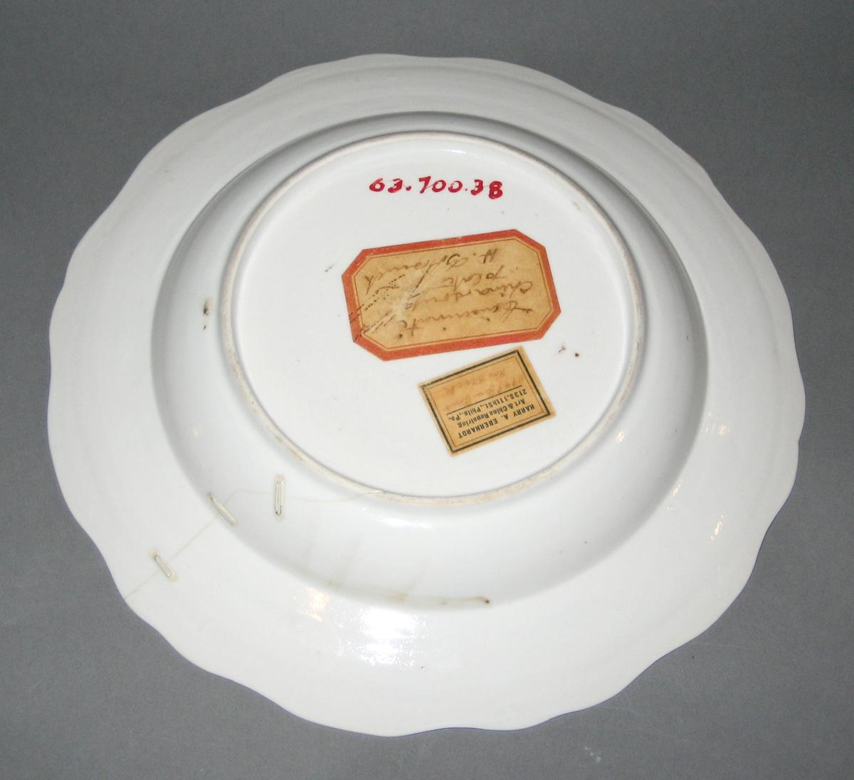 1963.0700.038 Soup plate or bowl, underside with tags