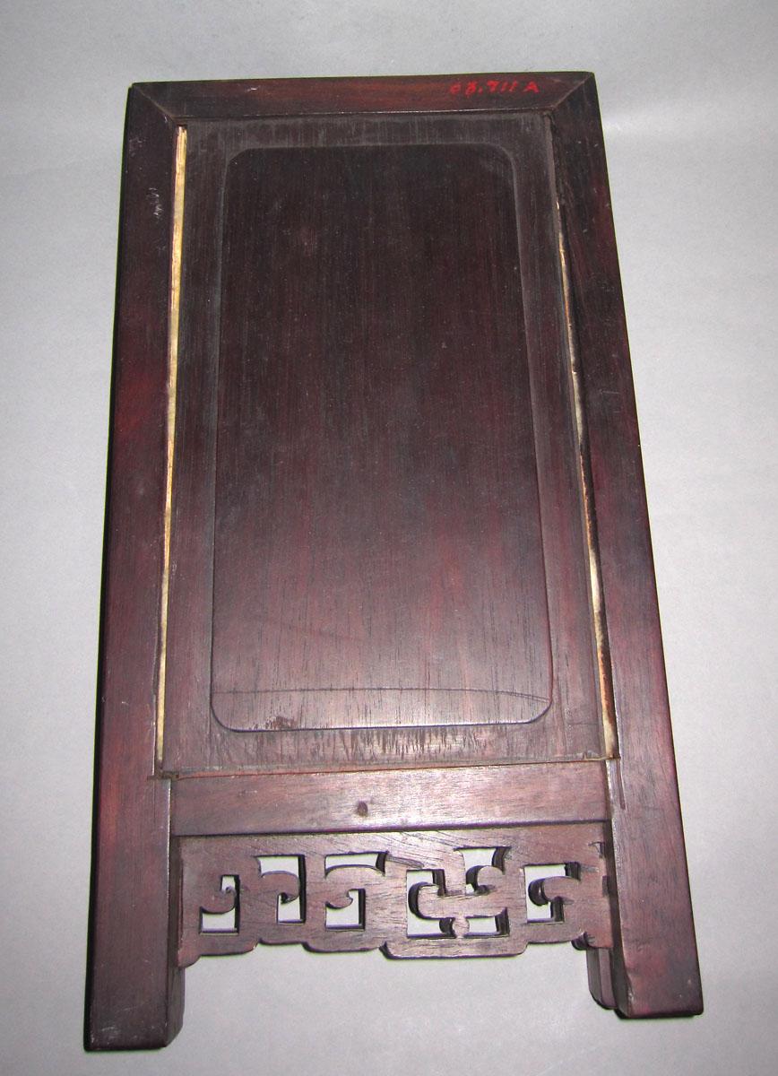 1963.0711 A-D Porcelain and wood table screen closed