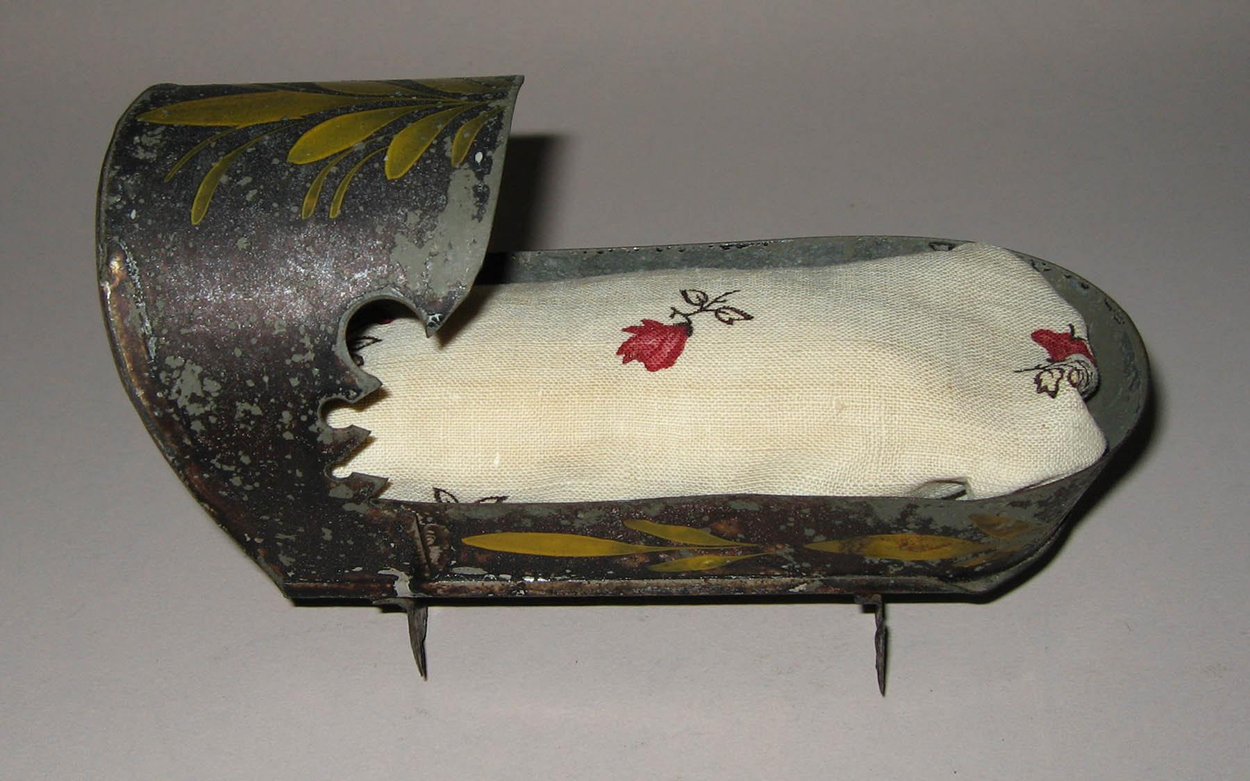 1955.0136.106 Cradle (with bedding)