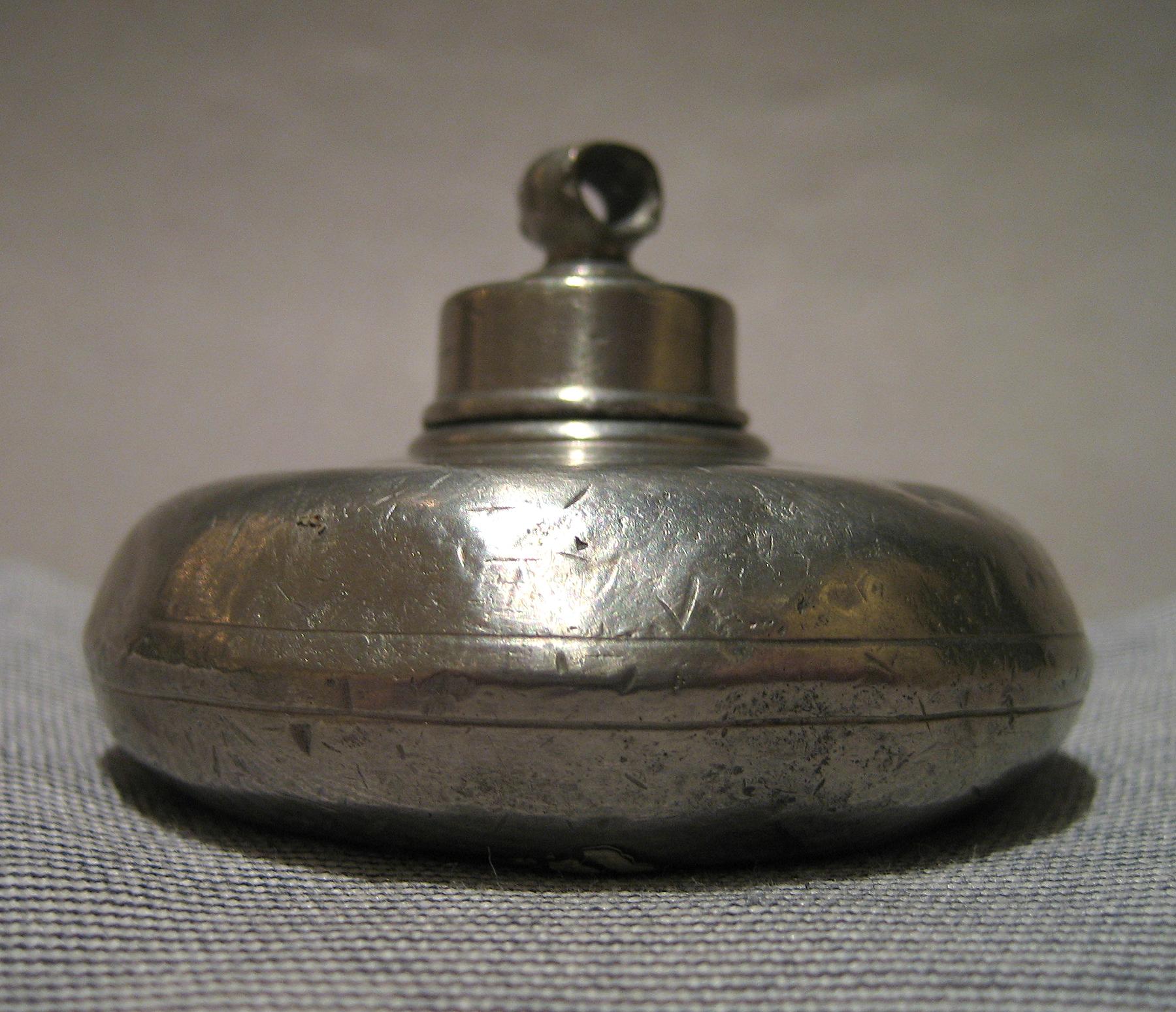 1955.0136.113 A, B Pewter Bottle, side view