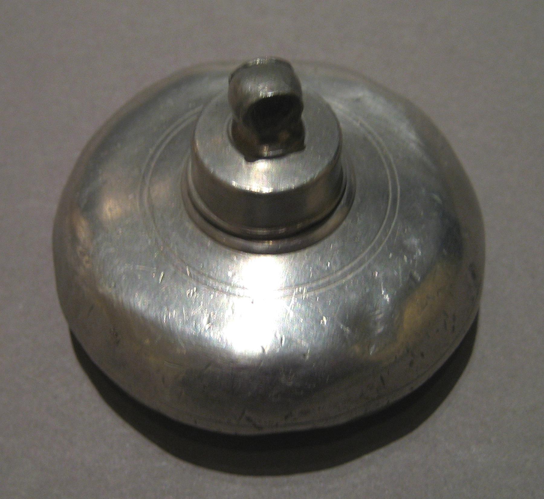 1955.0136.113 A, B Pewter Bottle, top view