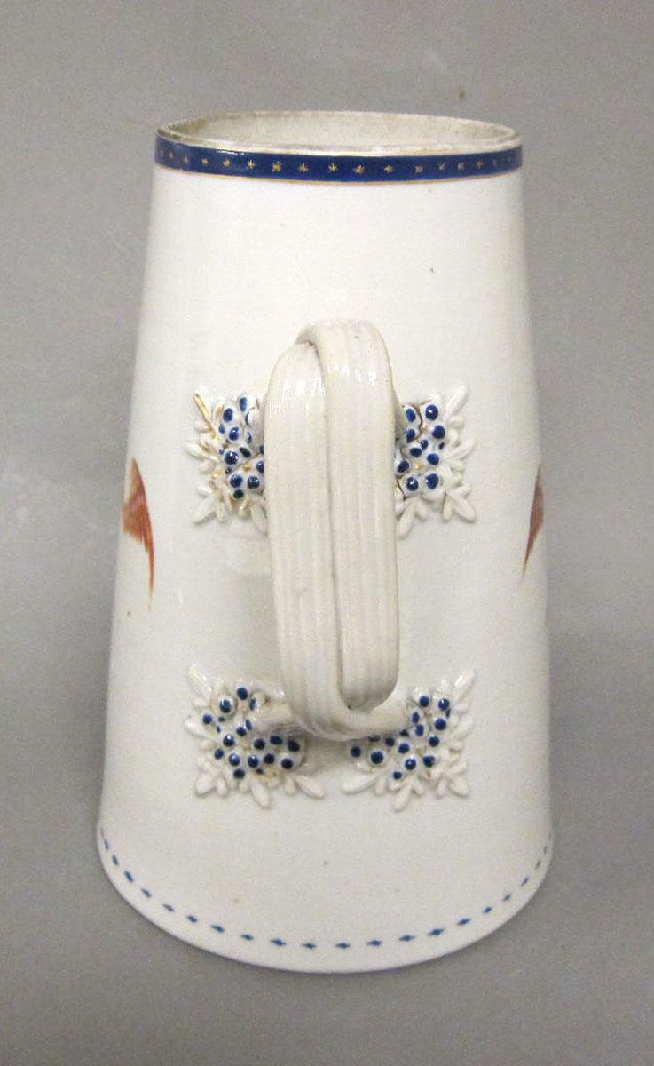 1963.0753 A Porcelain coffee pot handle
