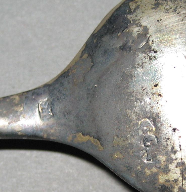 1963.0763.011 Spoon (mark)