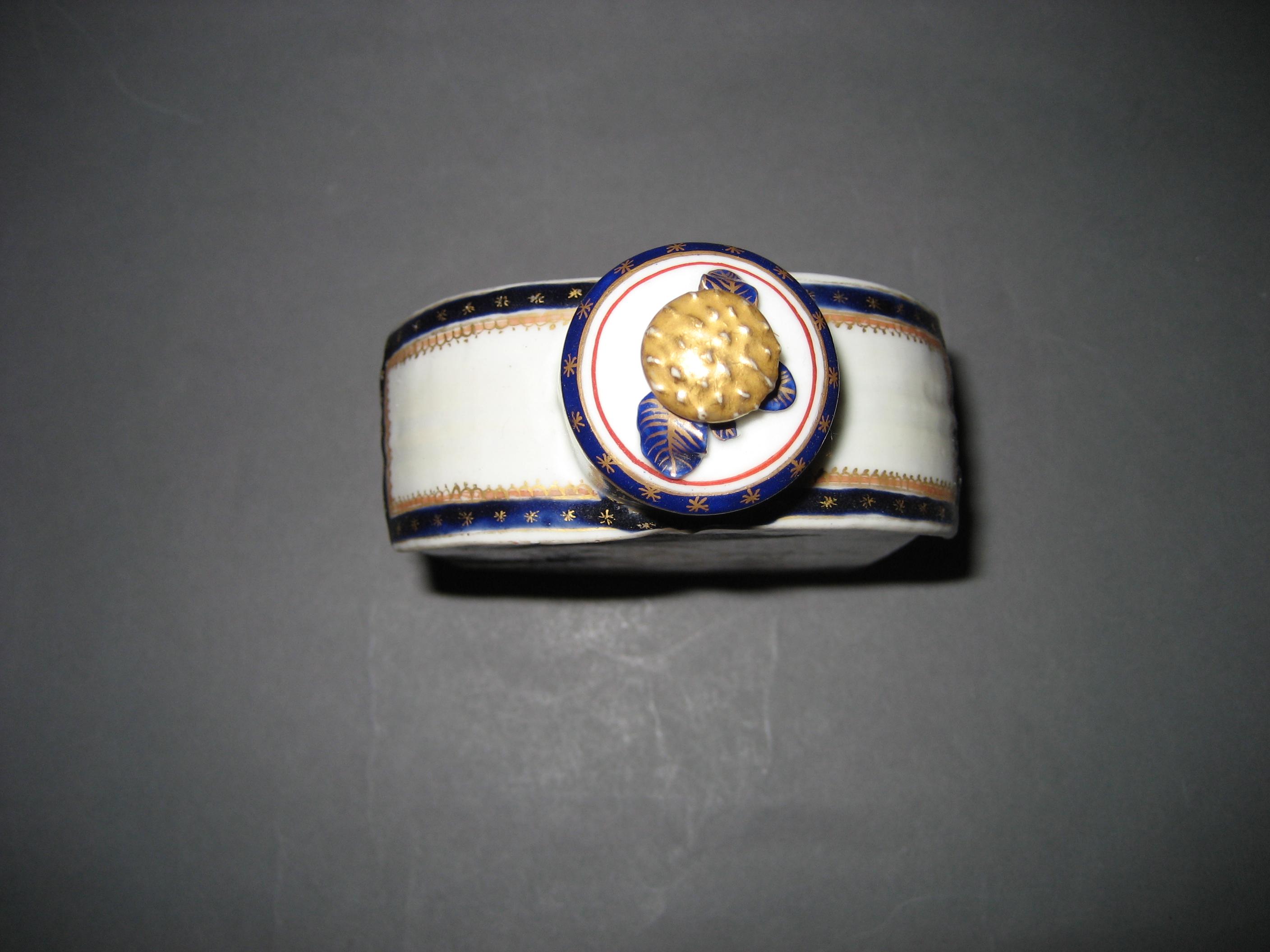 1963.0810 A, B Porcelain Tea Cannister top view