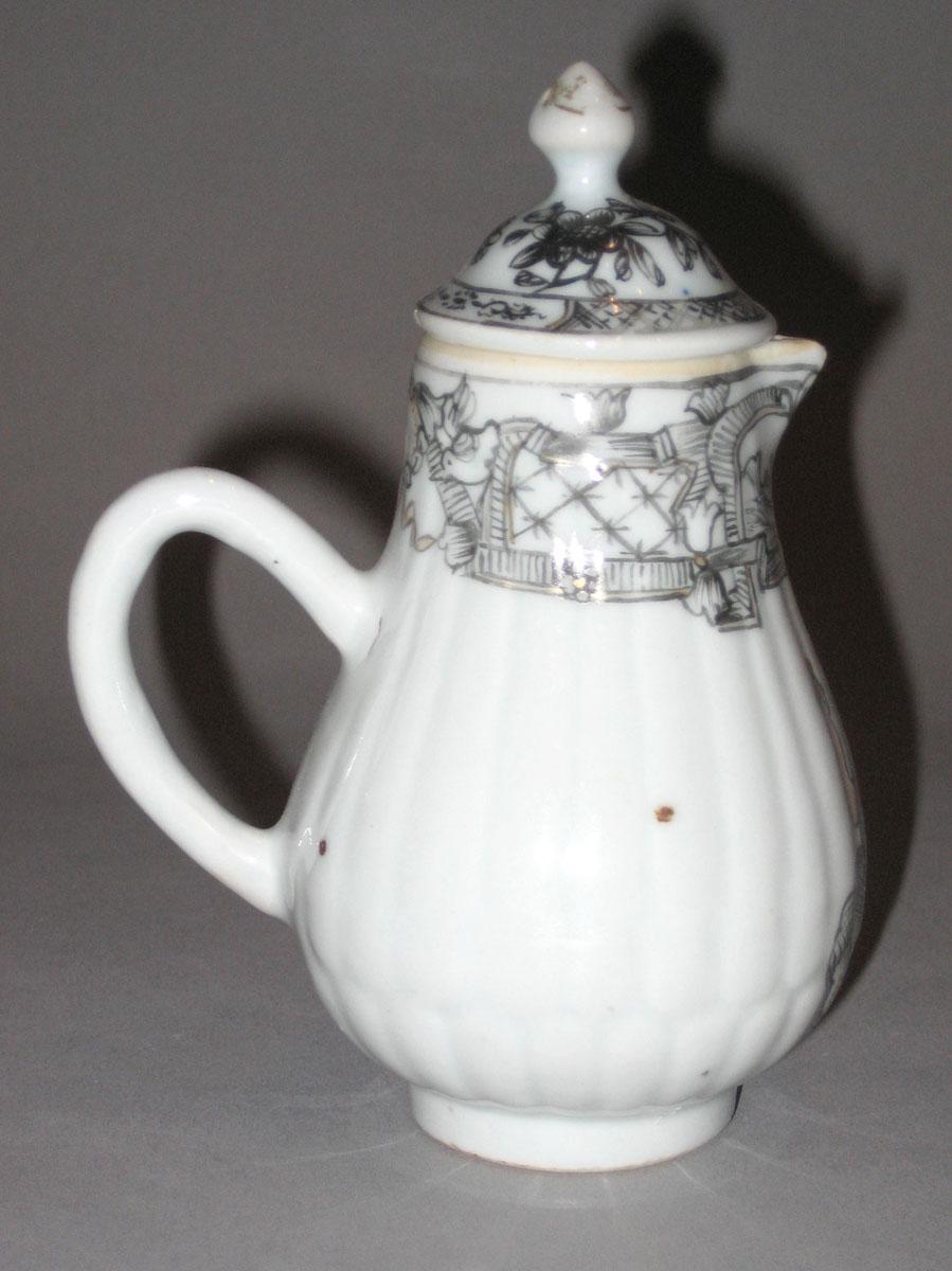 1963.0847 A, B Porcelain milk jug side 2