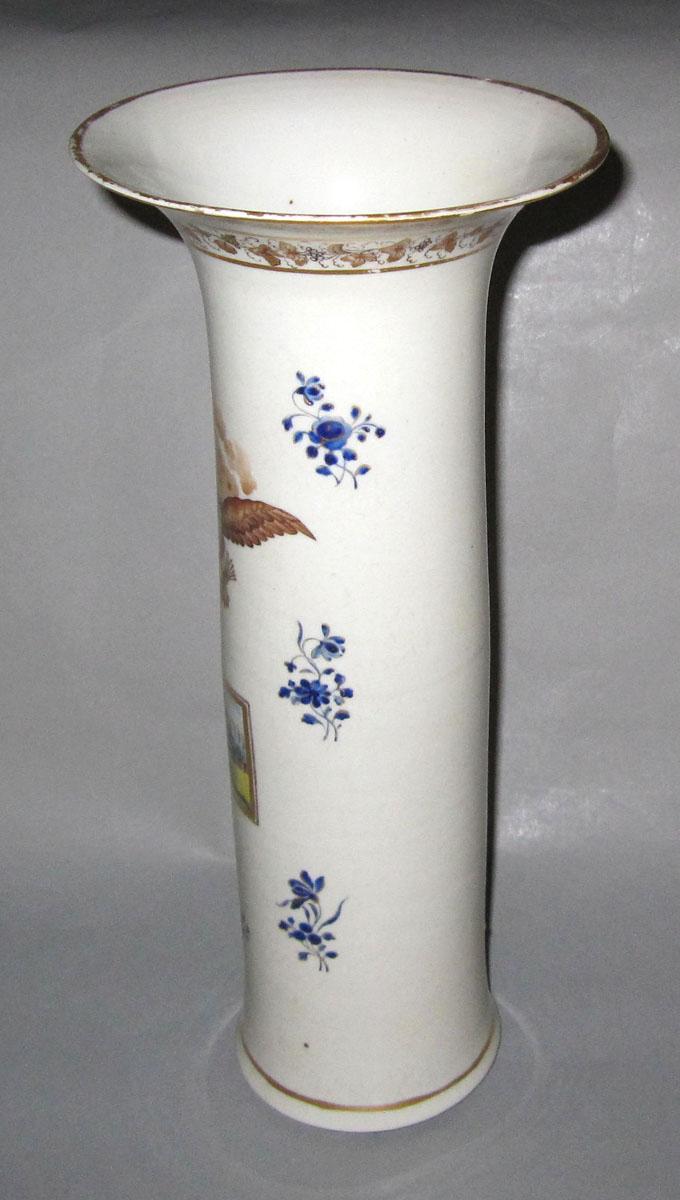 1963.0869 Porcelain flower container face two