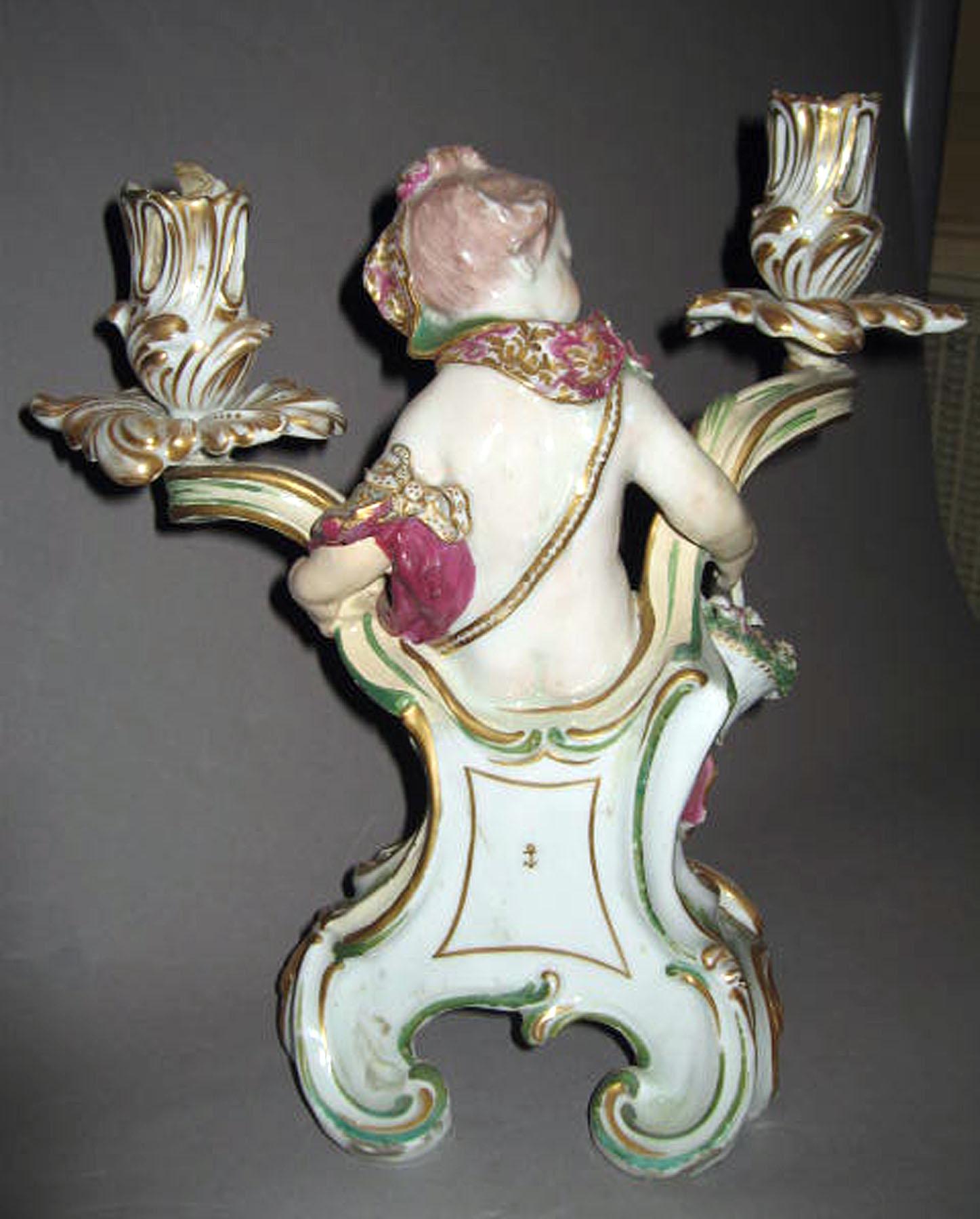 1963.0915 Porcelain candlestick figure (reverse)