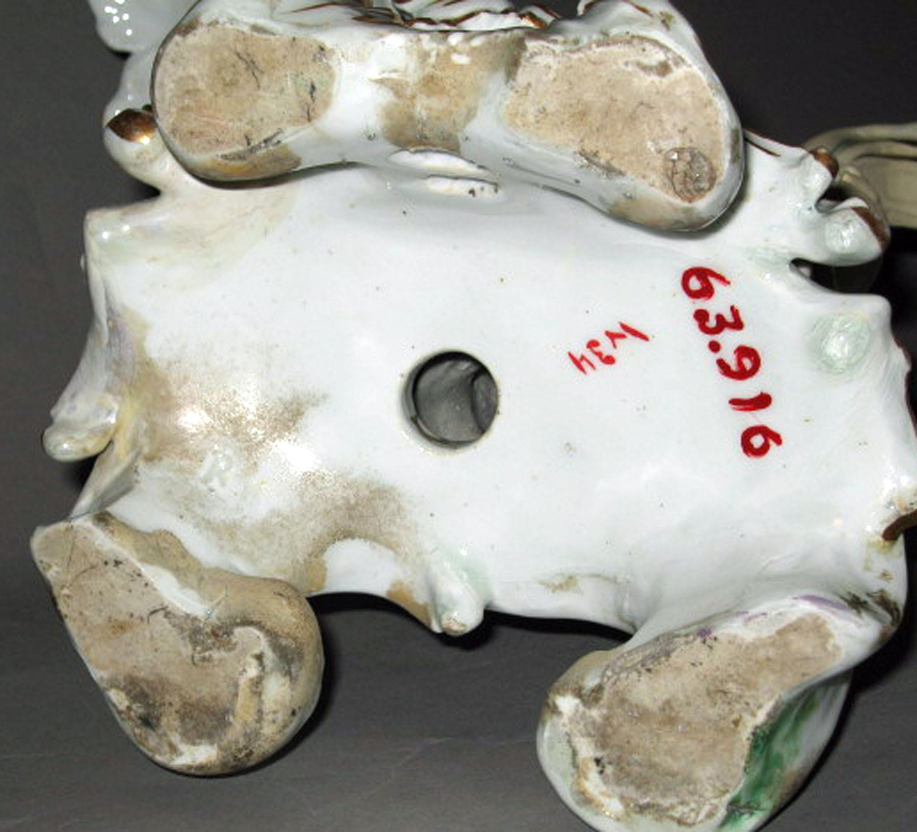1963.0916 Porcelain candlestick figure (underside)