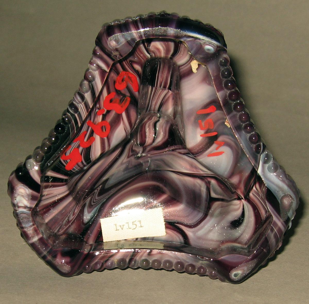 1963.0925 Glass candlestick (underside)