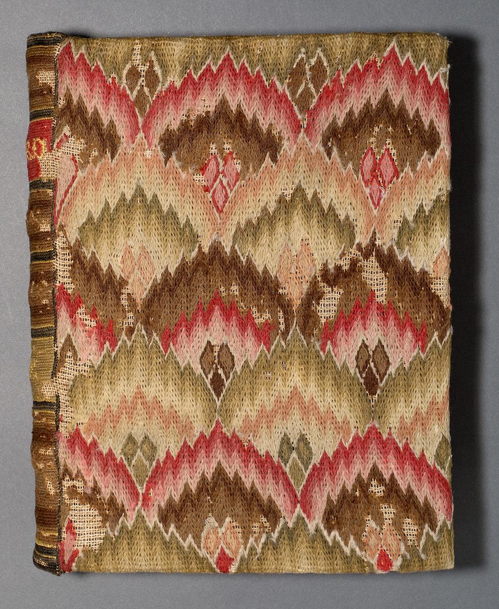1963.0067 Book cover, 1963.0955 Book, front