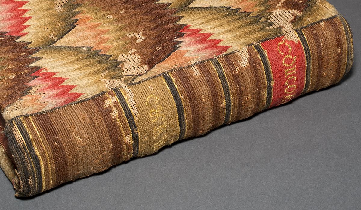 1963.0067 Book cover, 1963.0955 Book, detail 1