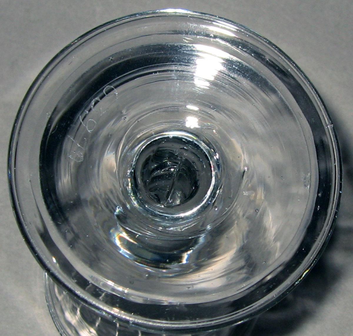 1963.0970 Glass wineglass (underside)