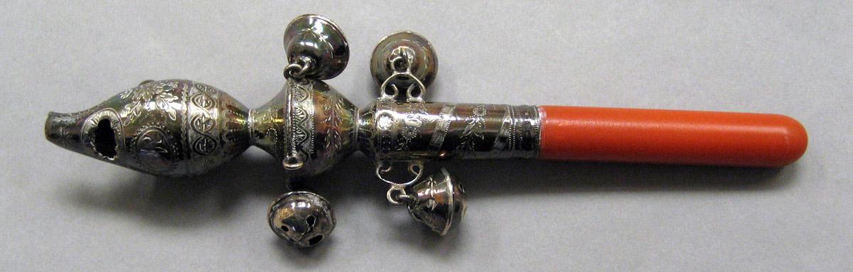 1964.0060 Silver and Coral Rattle upper surface