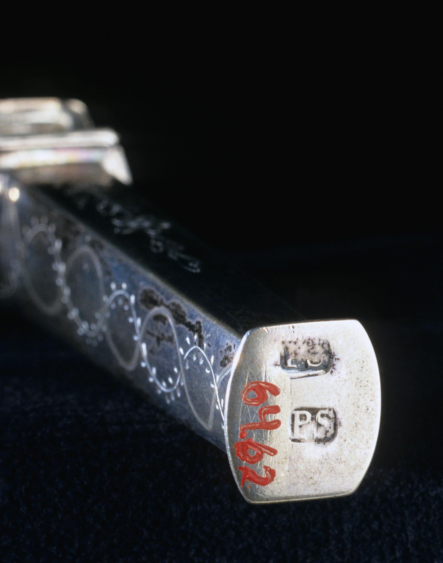 1964.0062 Container with seal, detail 1