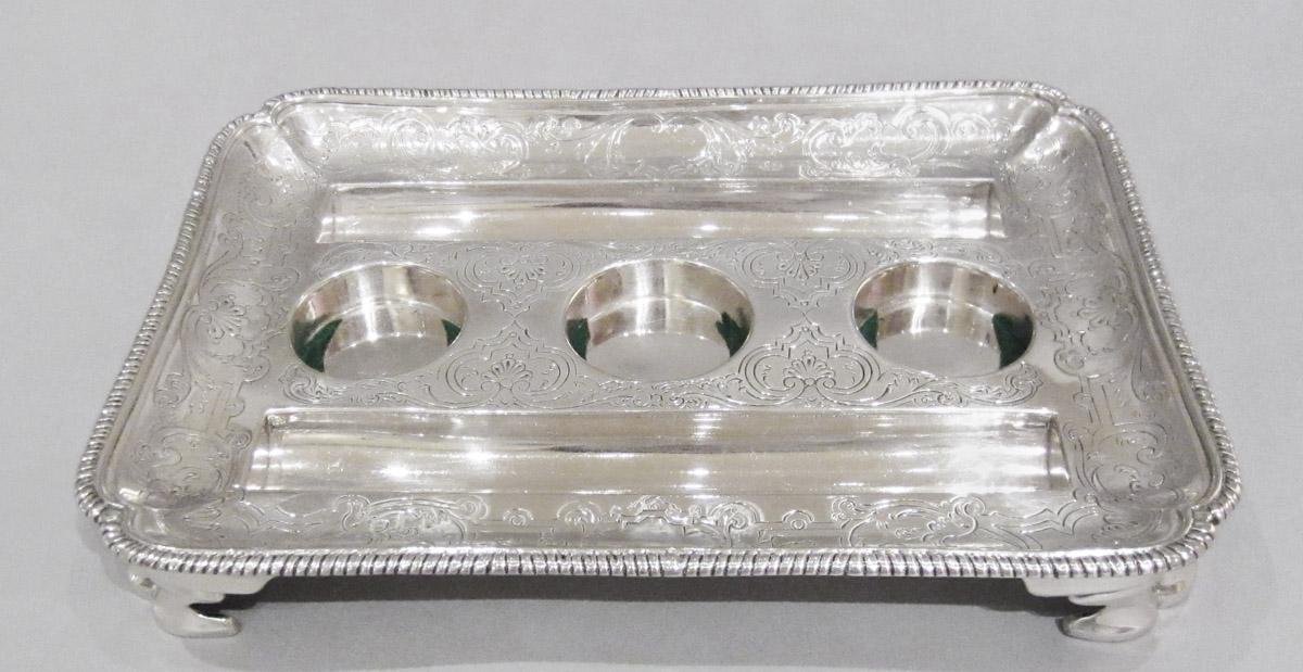 1964.0153 A Standish, tray, upper surface