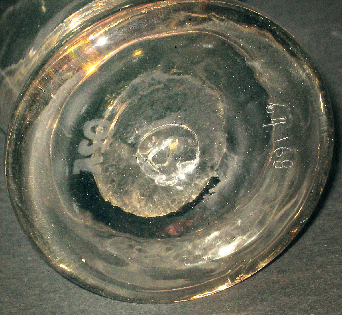 1964.0168 Glass tumbler (underside)