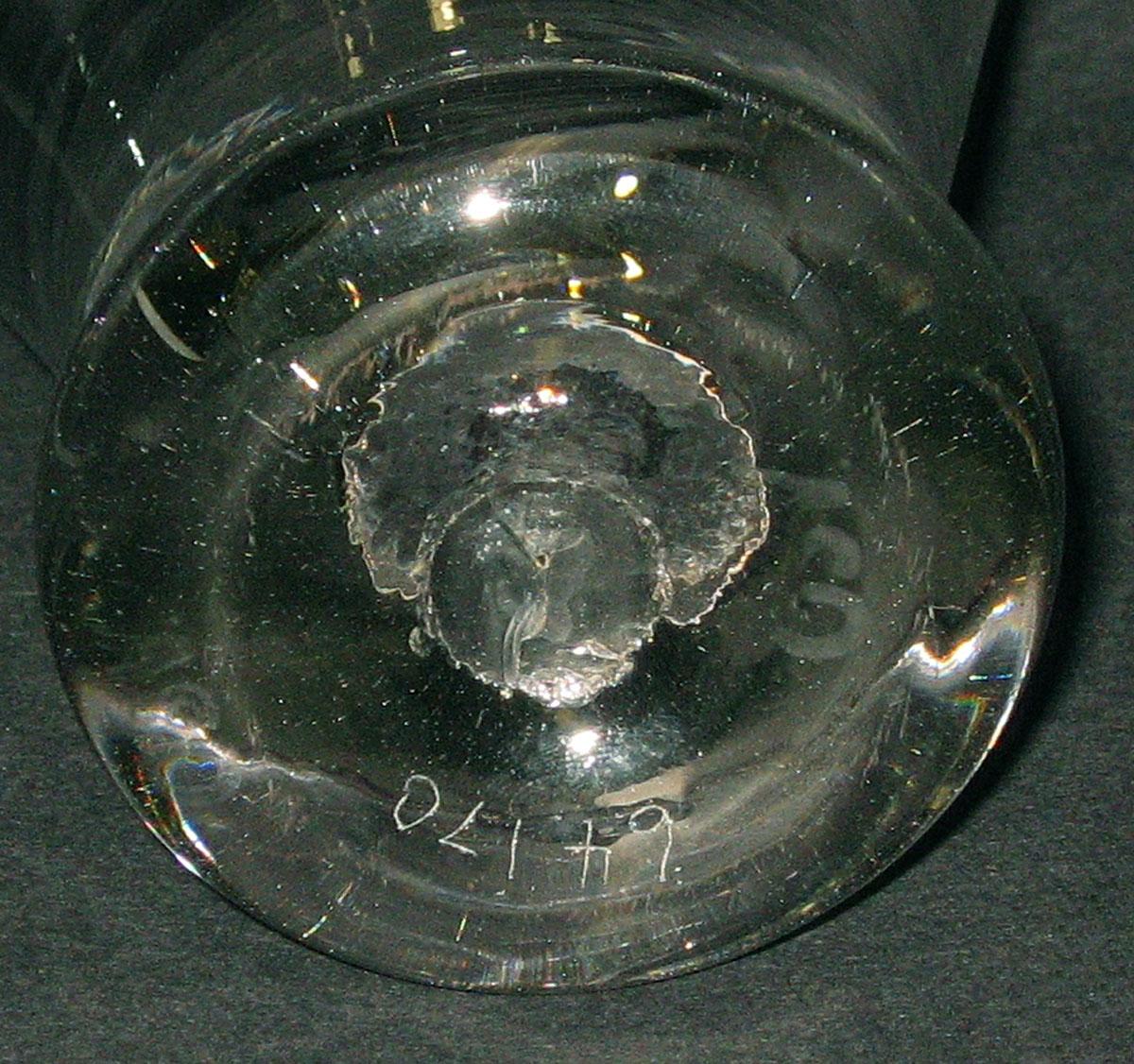 1964.0170 Glass tumbler (underside)