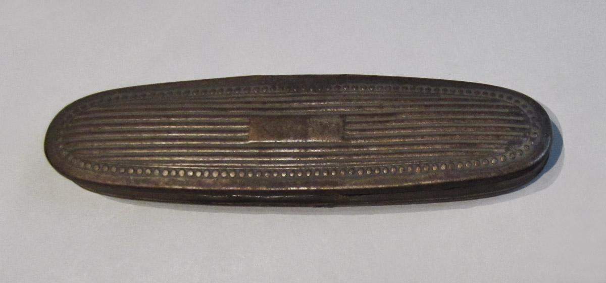 1964.0188 A Spectacles case, upper surface
