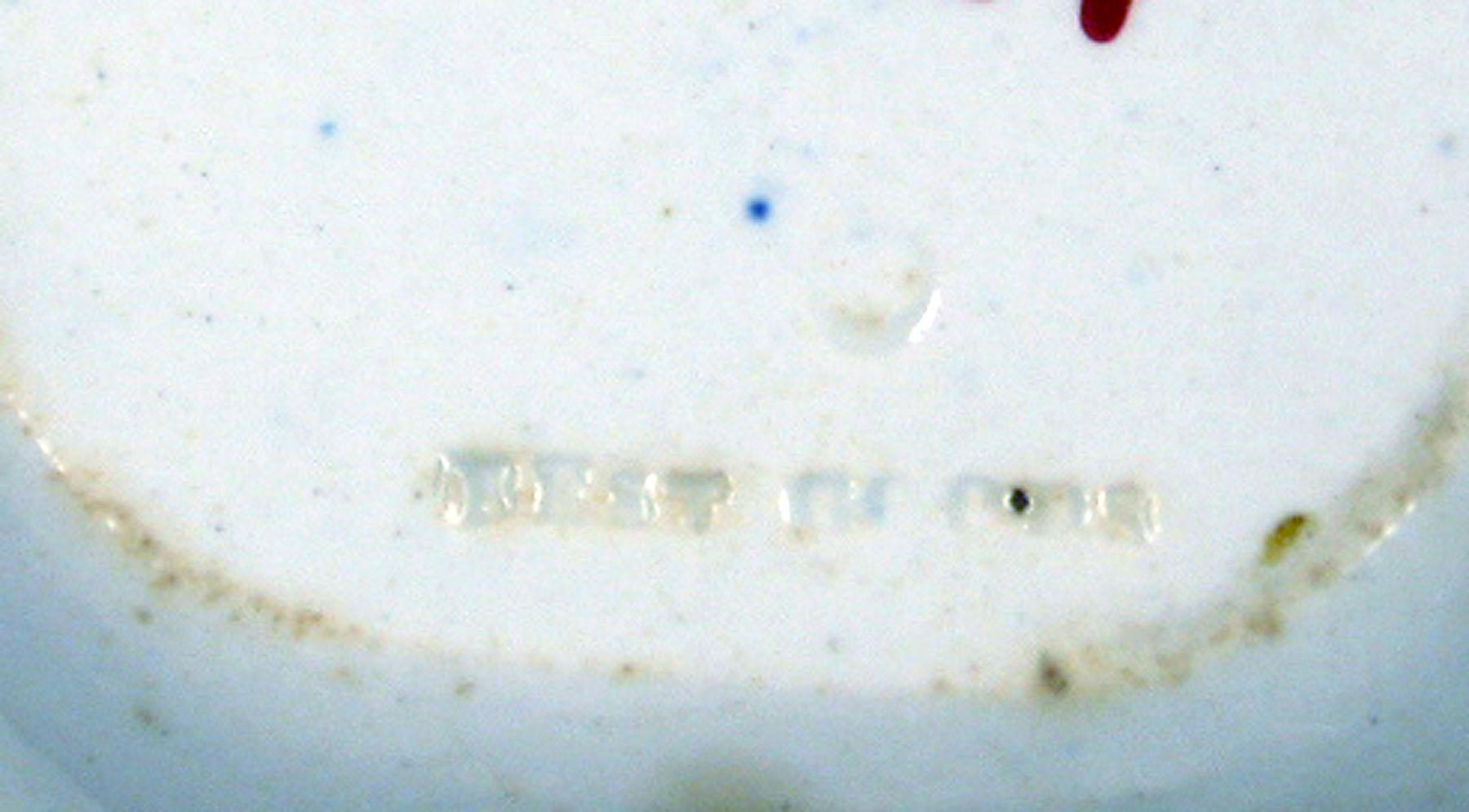 1955.0574 Pearlware dish (detail)