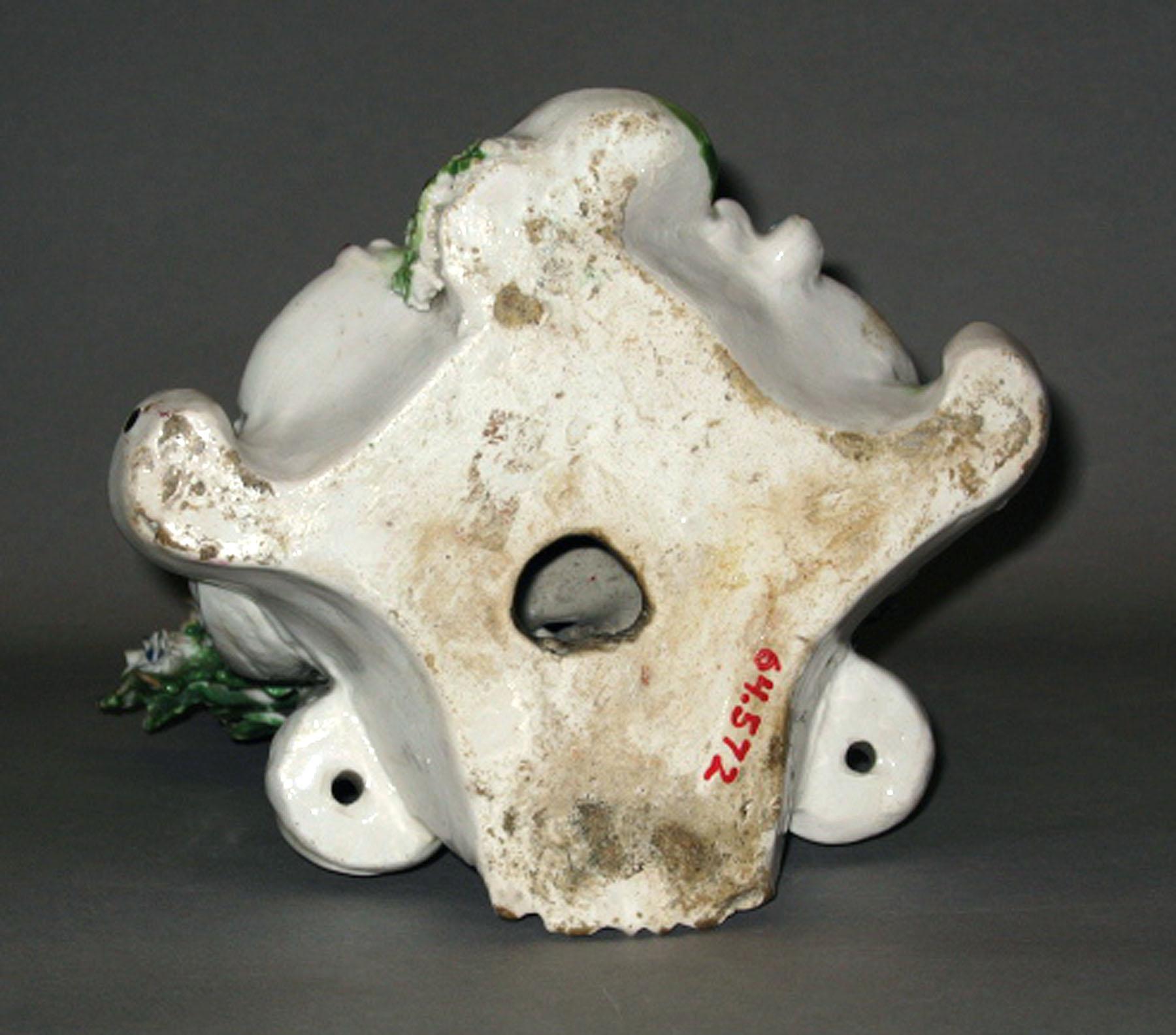 1964.0572 Porcelain figure (underside)