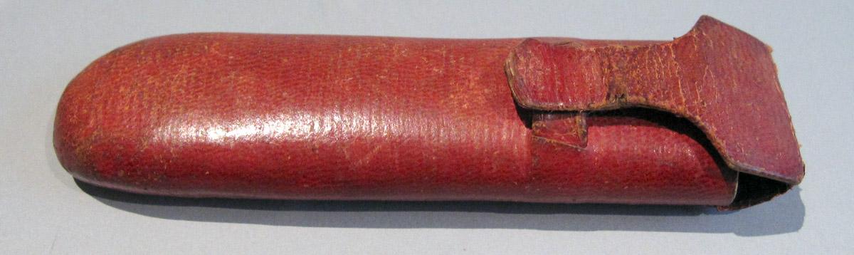 1964.0587 A Spectacles Case upper surface