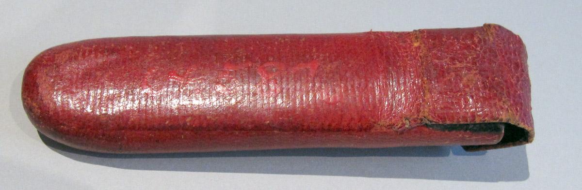 1964.0587 A Spectacles Case underside