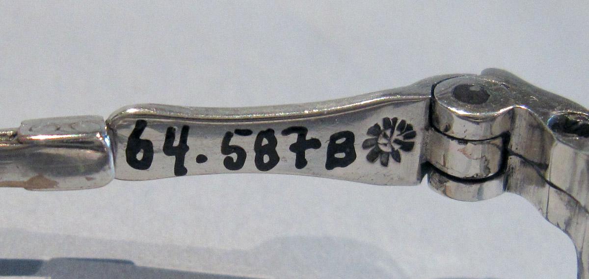 1964.0587 B Silver Spectacles mark 3