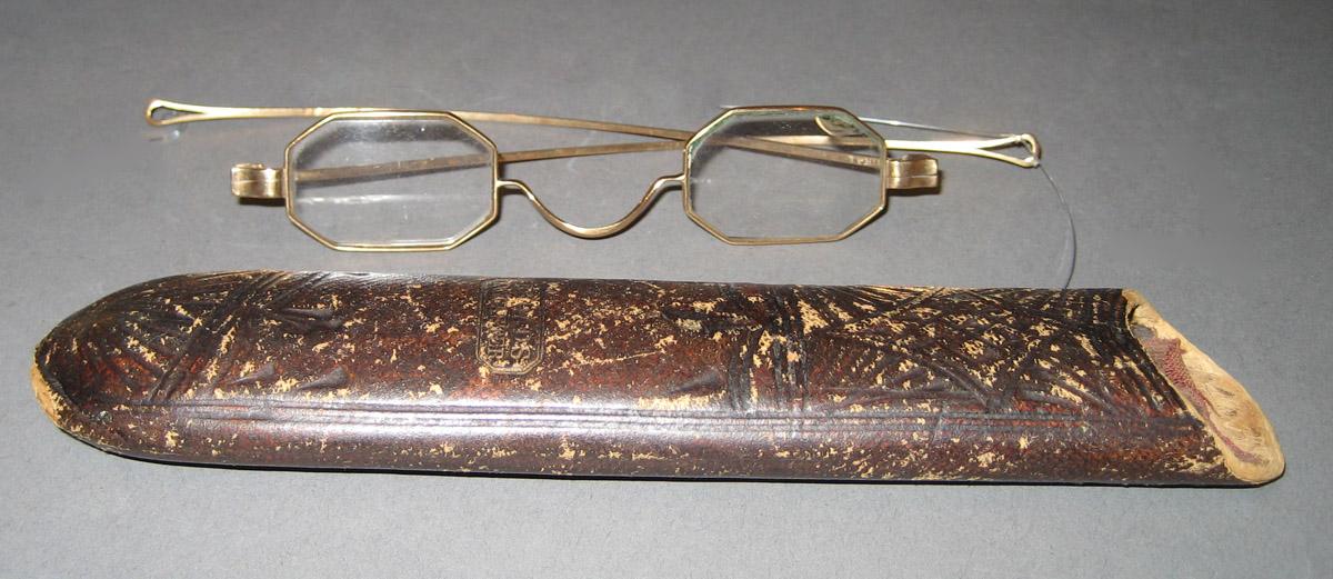 1964.0589 A, B Spectacles and case