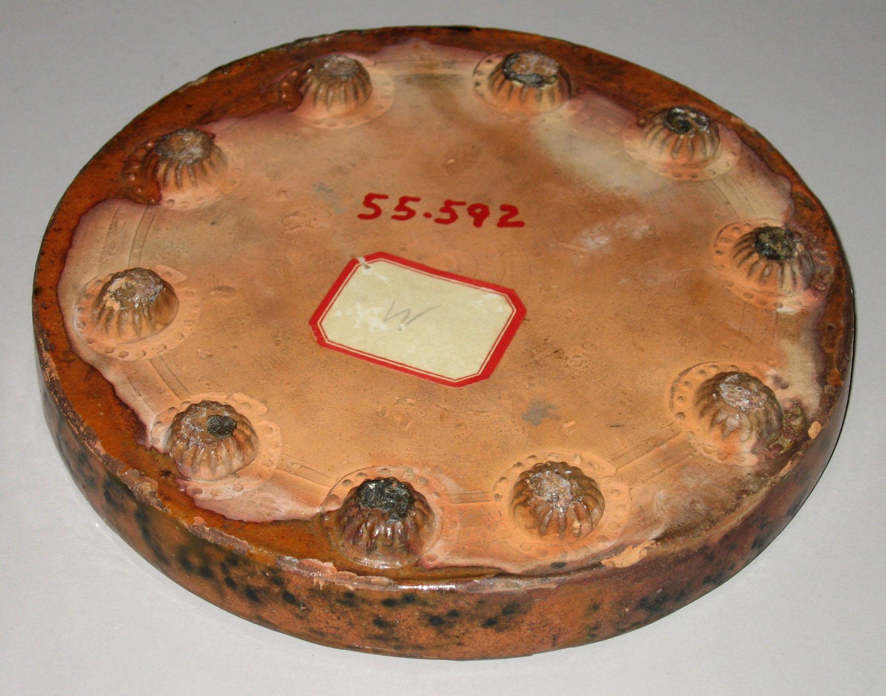 1955.0592 Redware trivet (bottom)