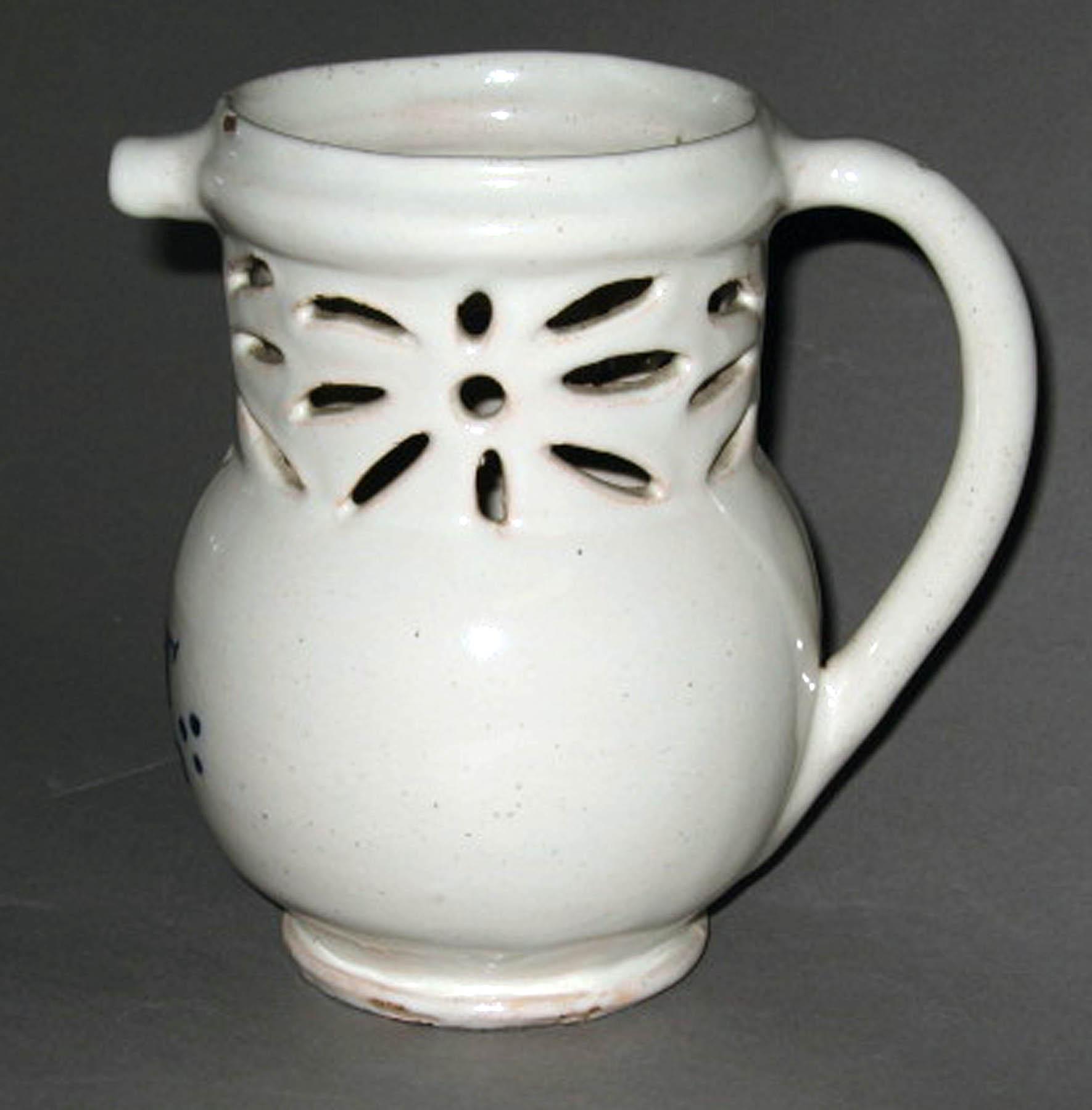 1964.0685 Faience puzzle jug (profile)