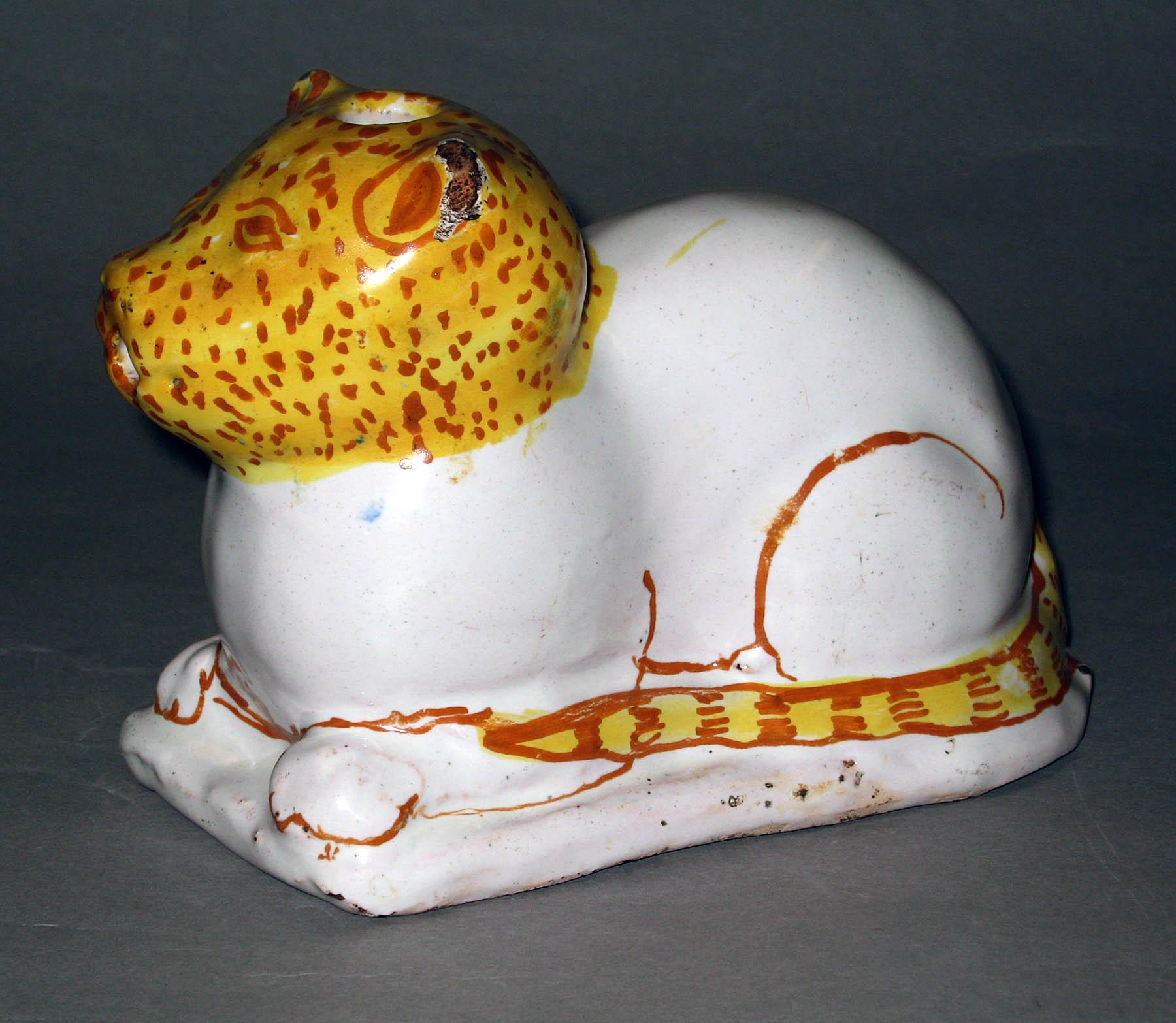 1964.0702 Earthenware figure of a cat
