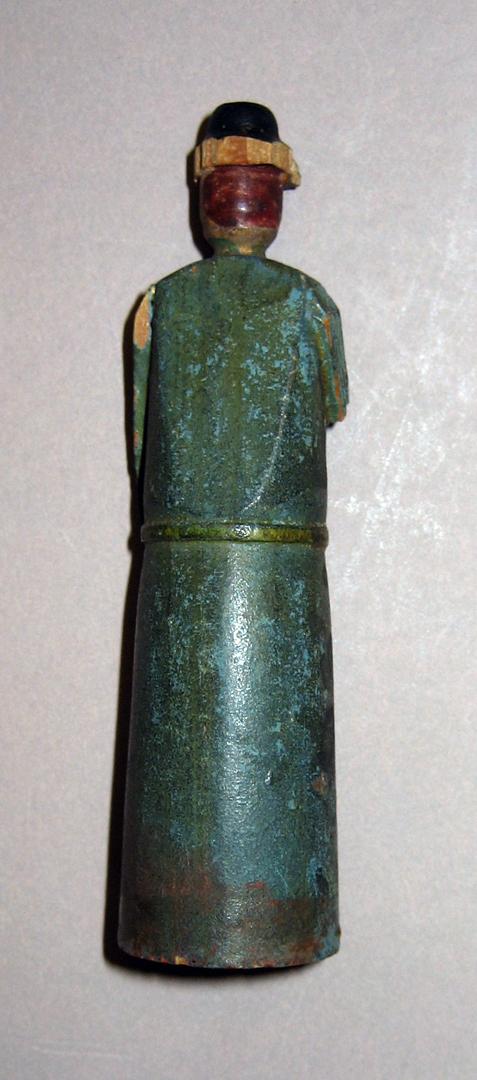 1964.0874.084 Figure back