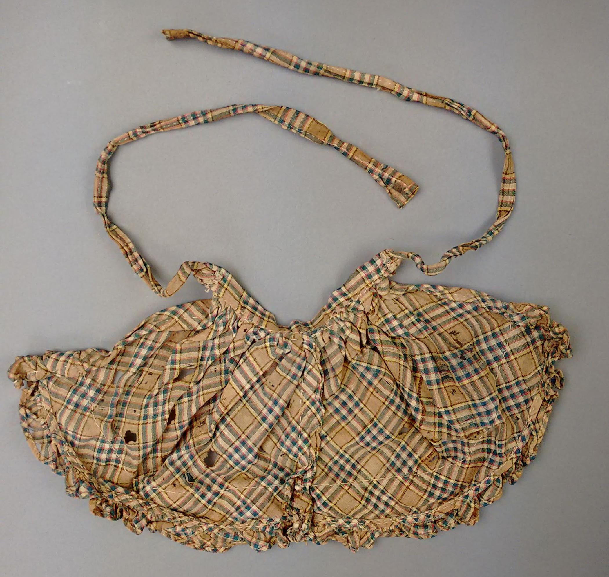1964.0878 Doll, apron, view 2