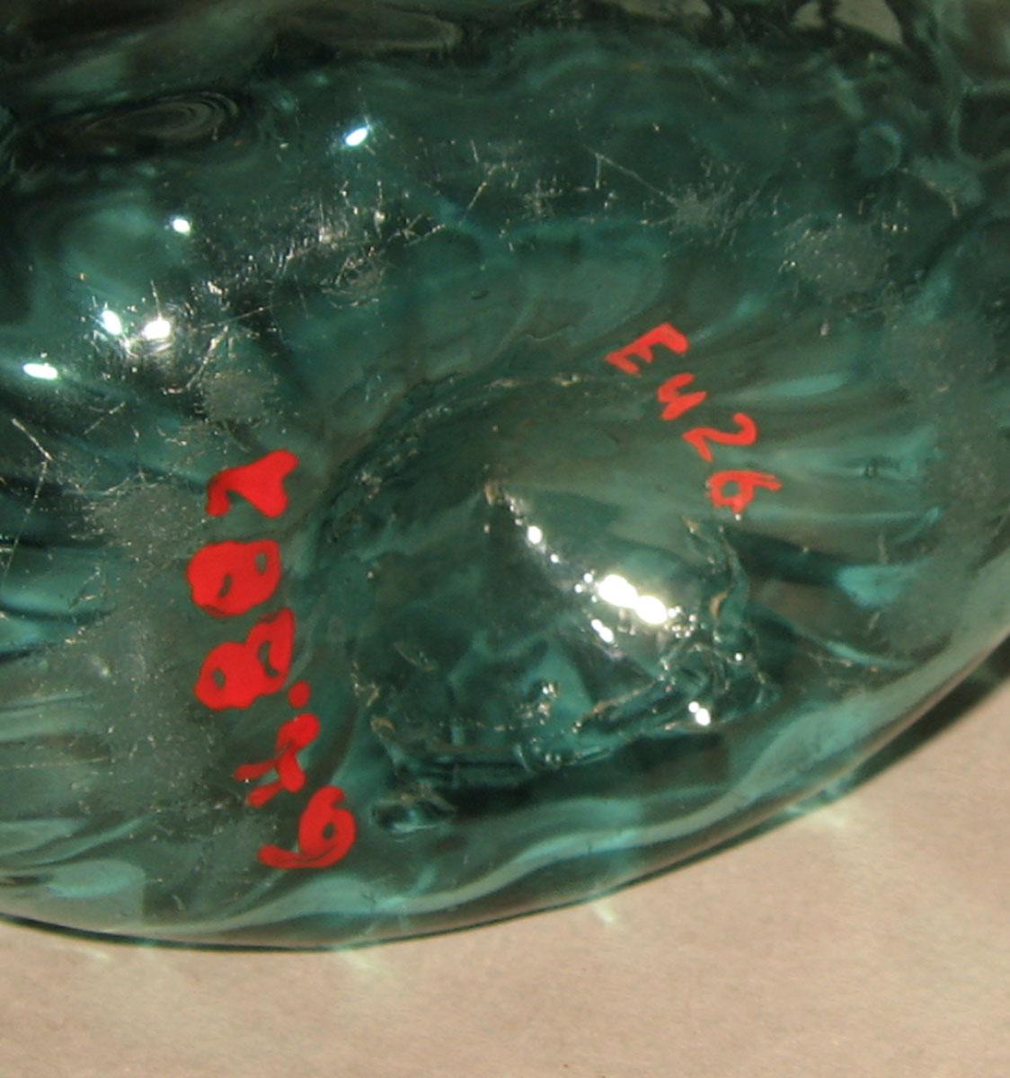 1964.0882 Glass flask (underside)