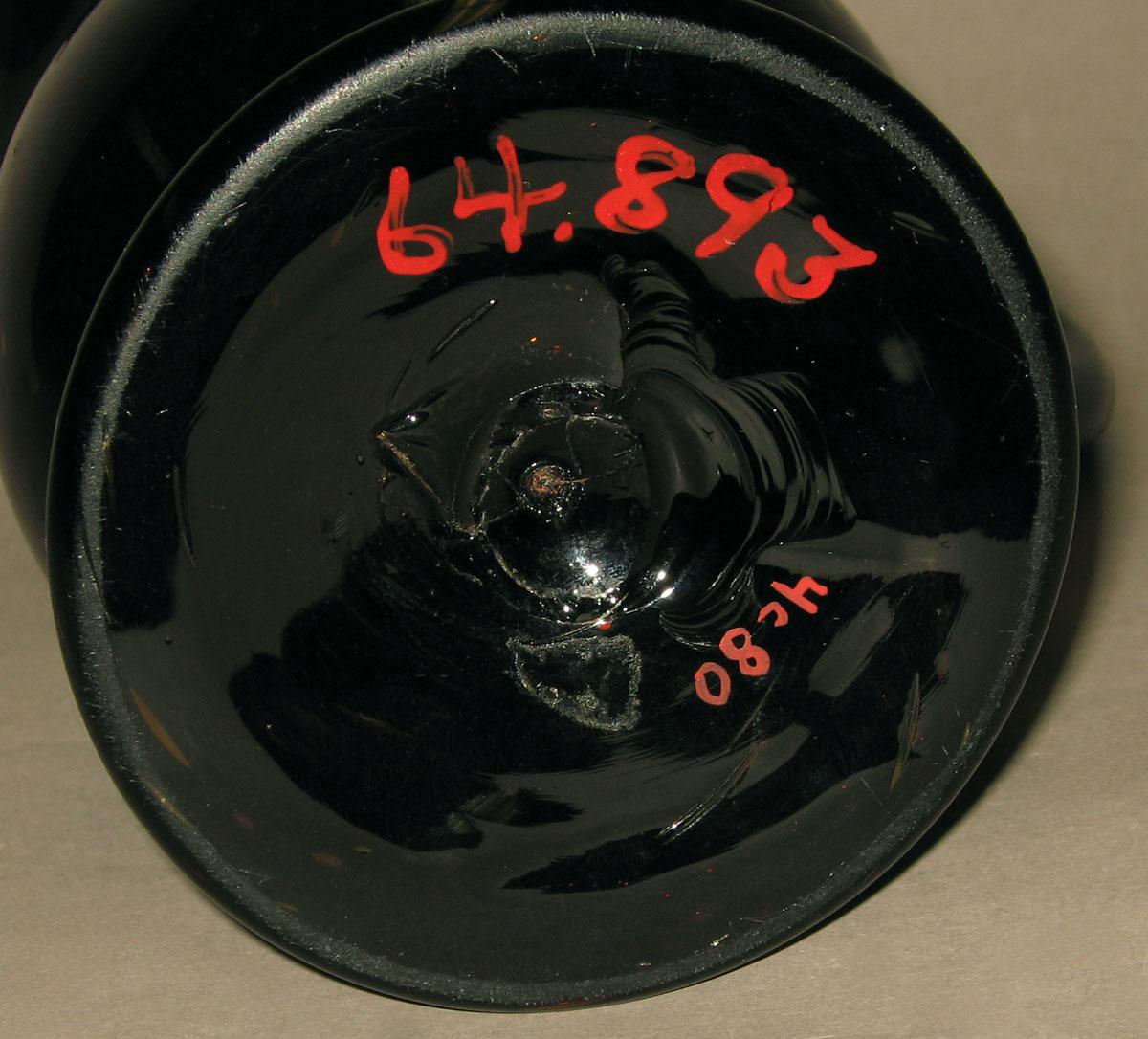 1964.0893 Glass jug (underside)