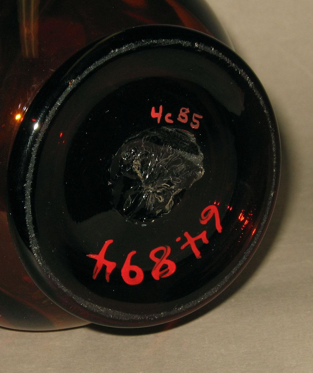 1964.0894 Glass jug (underside)