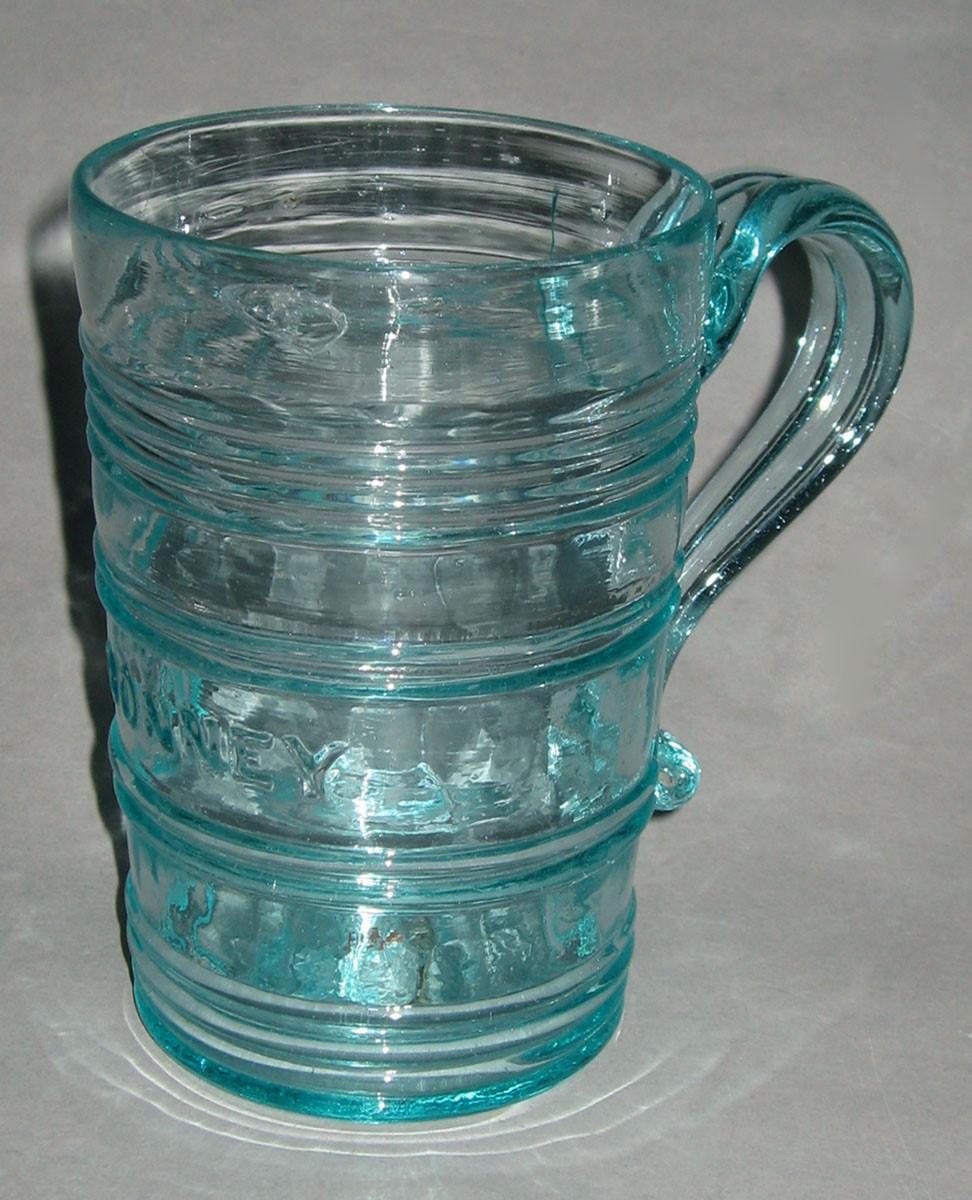 1964.0907 Glass mug, view 2