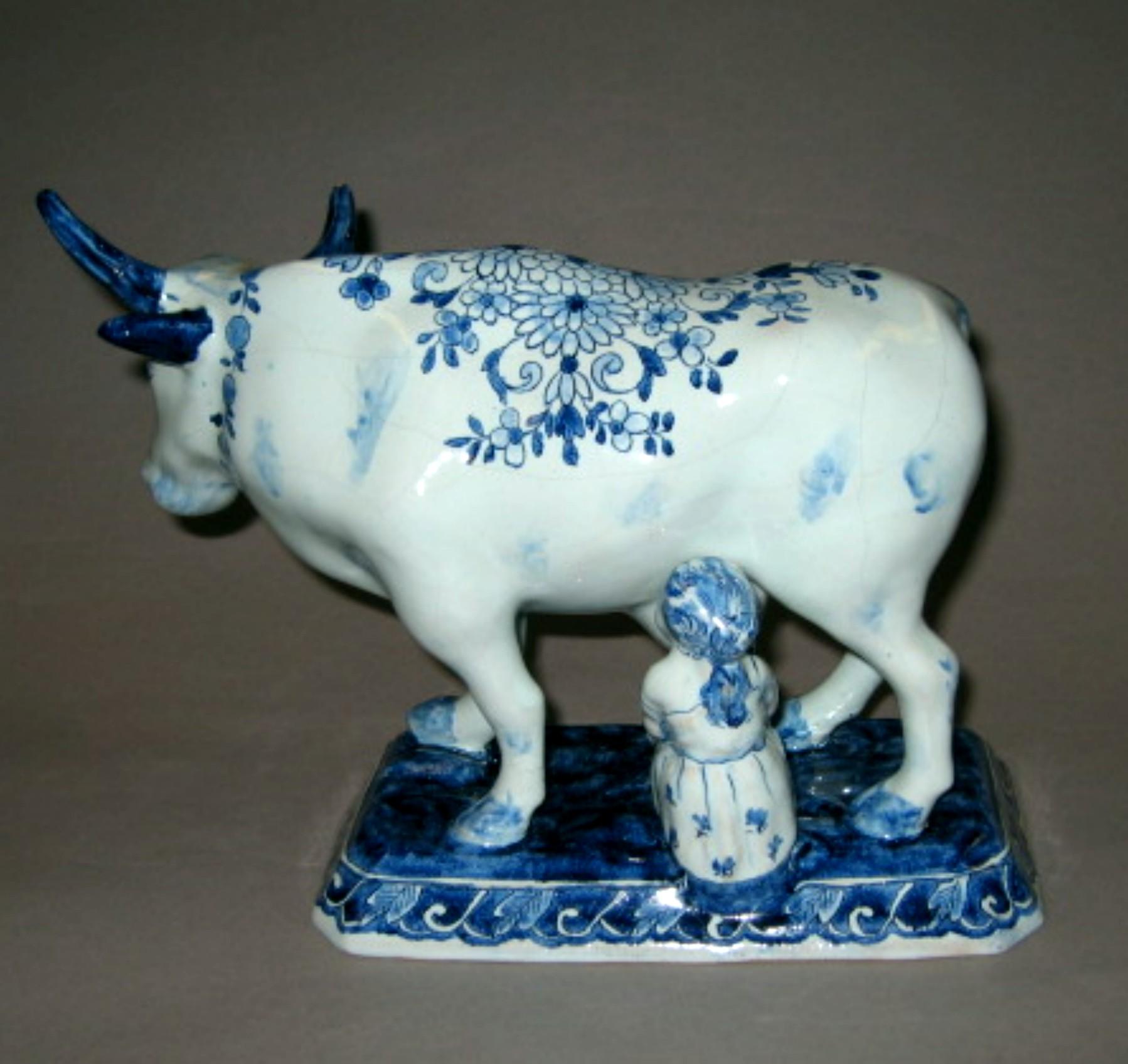 1964.0970 Tin-glazed earthenware figure (reverse)